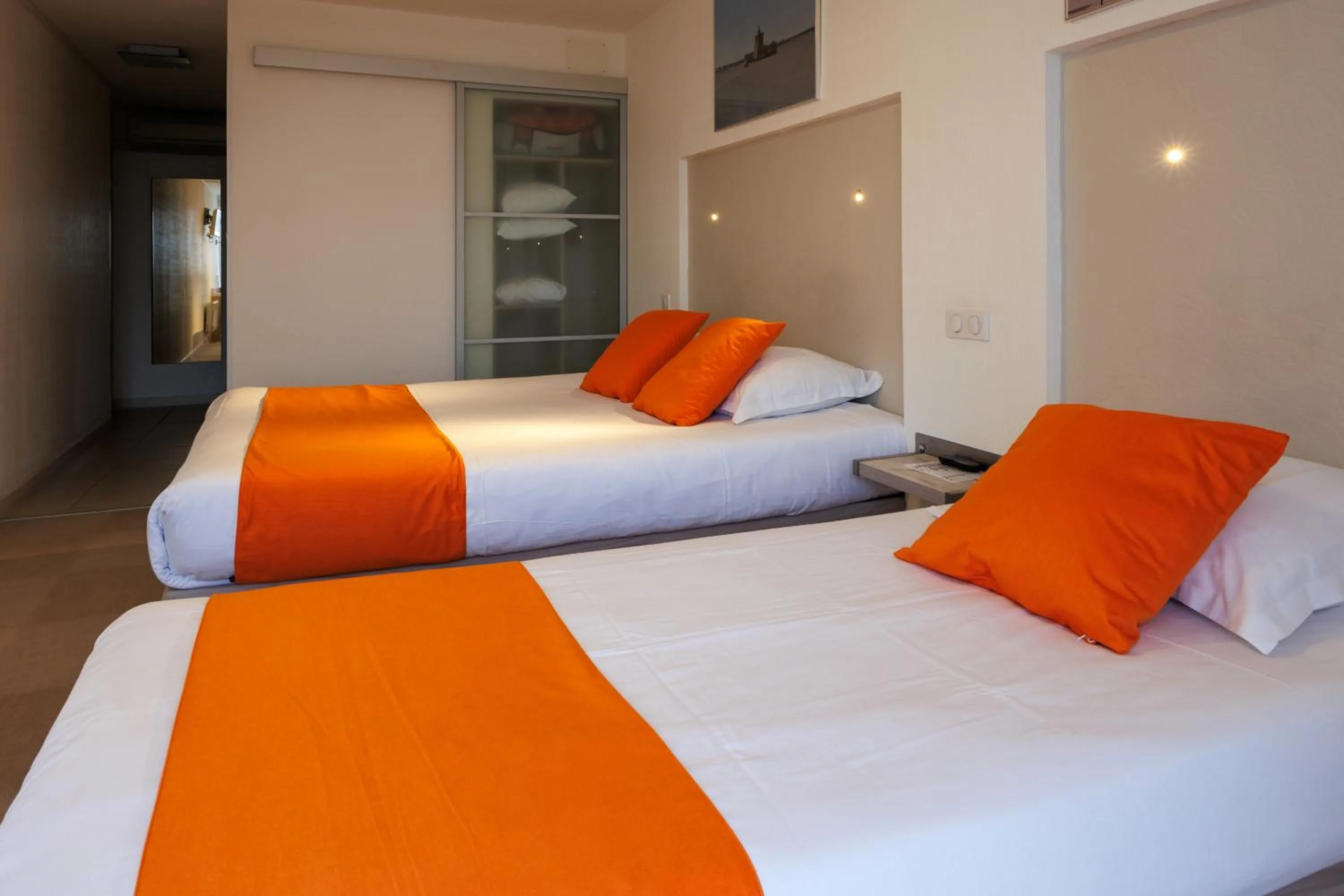 Bedroom, Bed in Logis Hôtel Le Rochelois