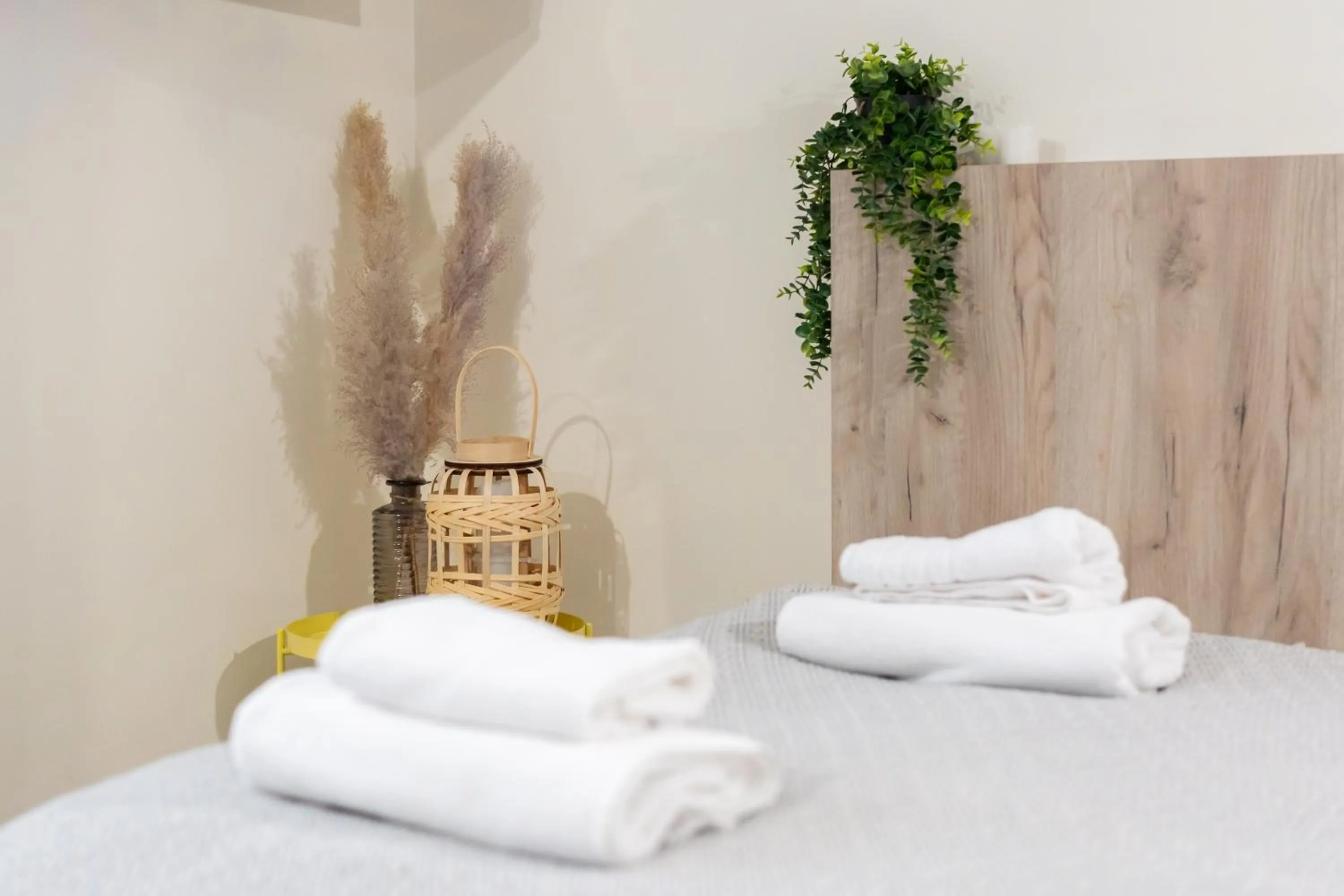 Decorative detail, Bed in Aparthotel przy Bulwarze by Rentoom