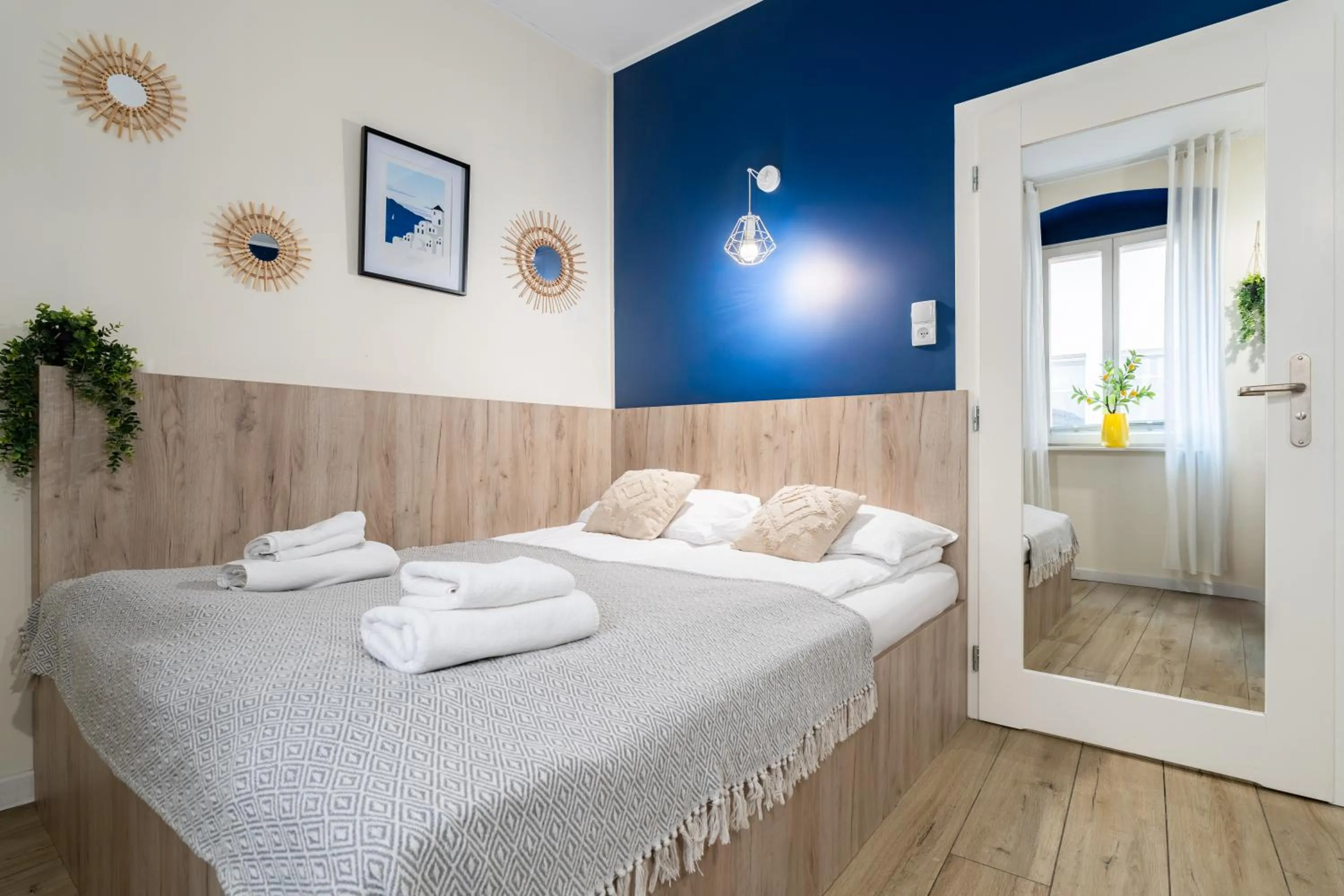 Decorative detail, Bed in Aparthotel przy Bulwarze by Rentoom