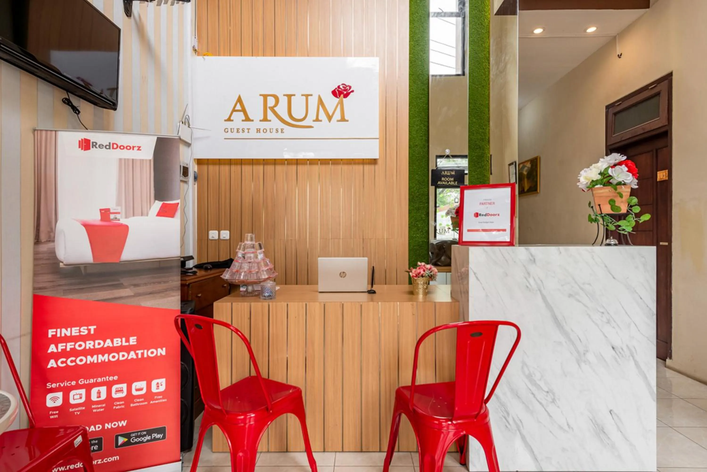 Property logo or sign in RedDoorz near Dino Park