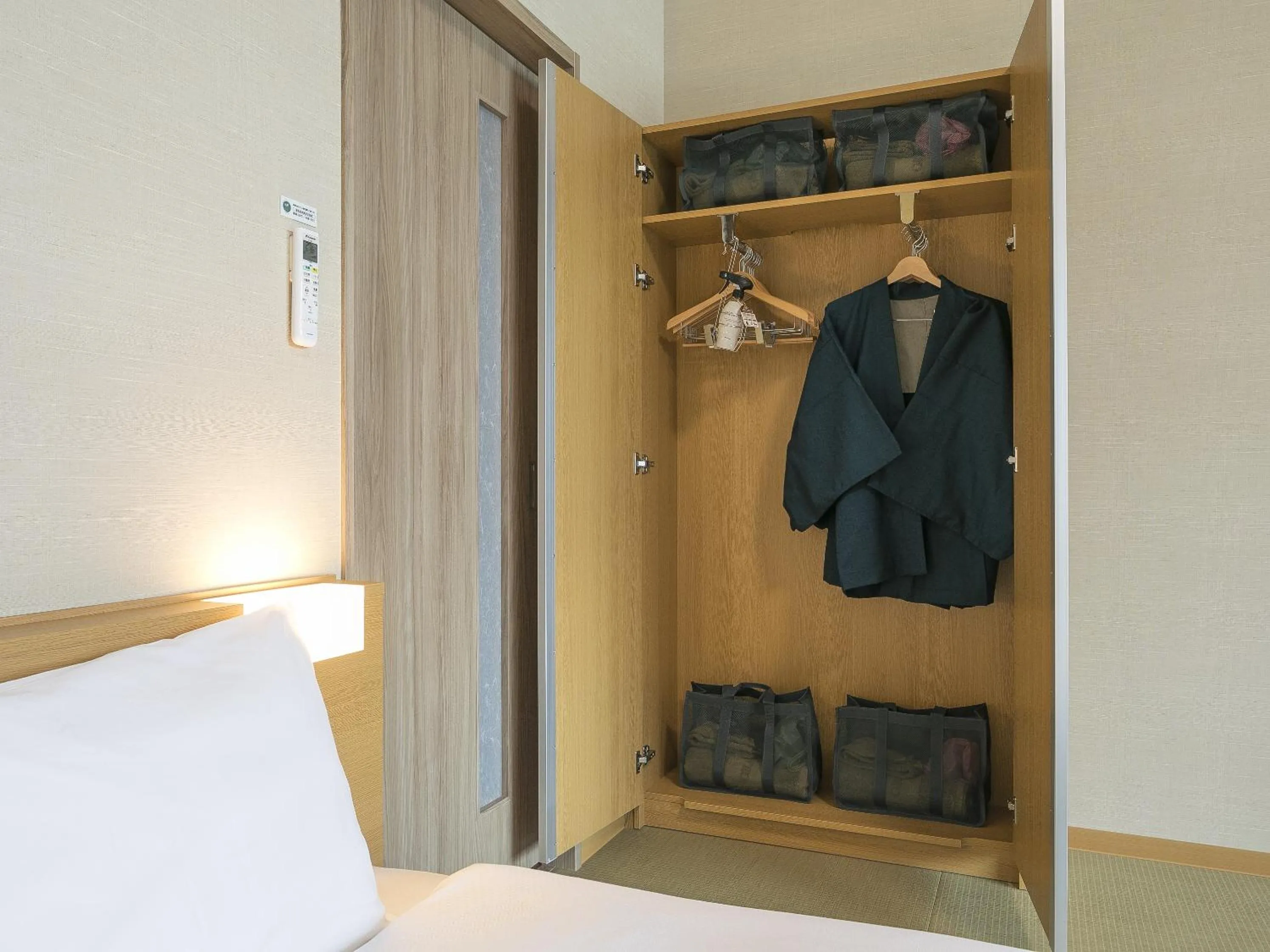 Photo of the whole room, Bed in Grandvrio Hotel Miyajima Wakura - ROUTE INN HOTELS -