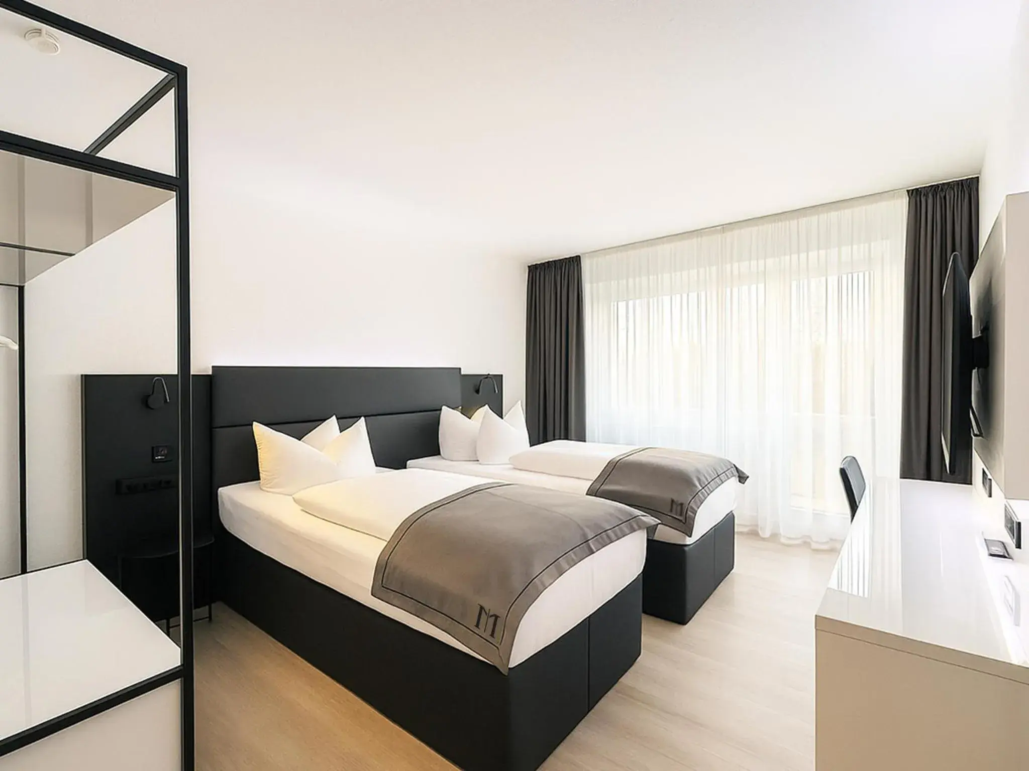 Twin Room in DORMERO Hotel Weimar Twin Room in DORMERO Hotel Weimar