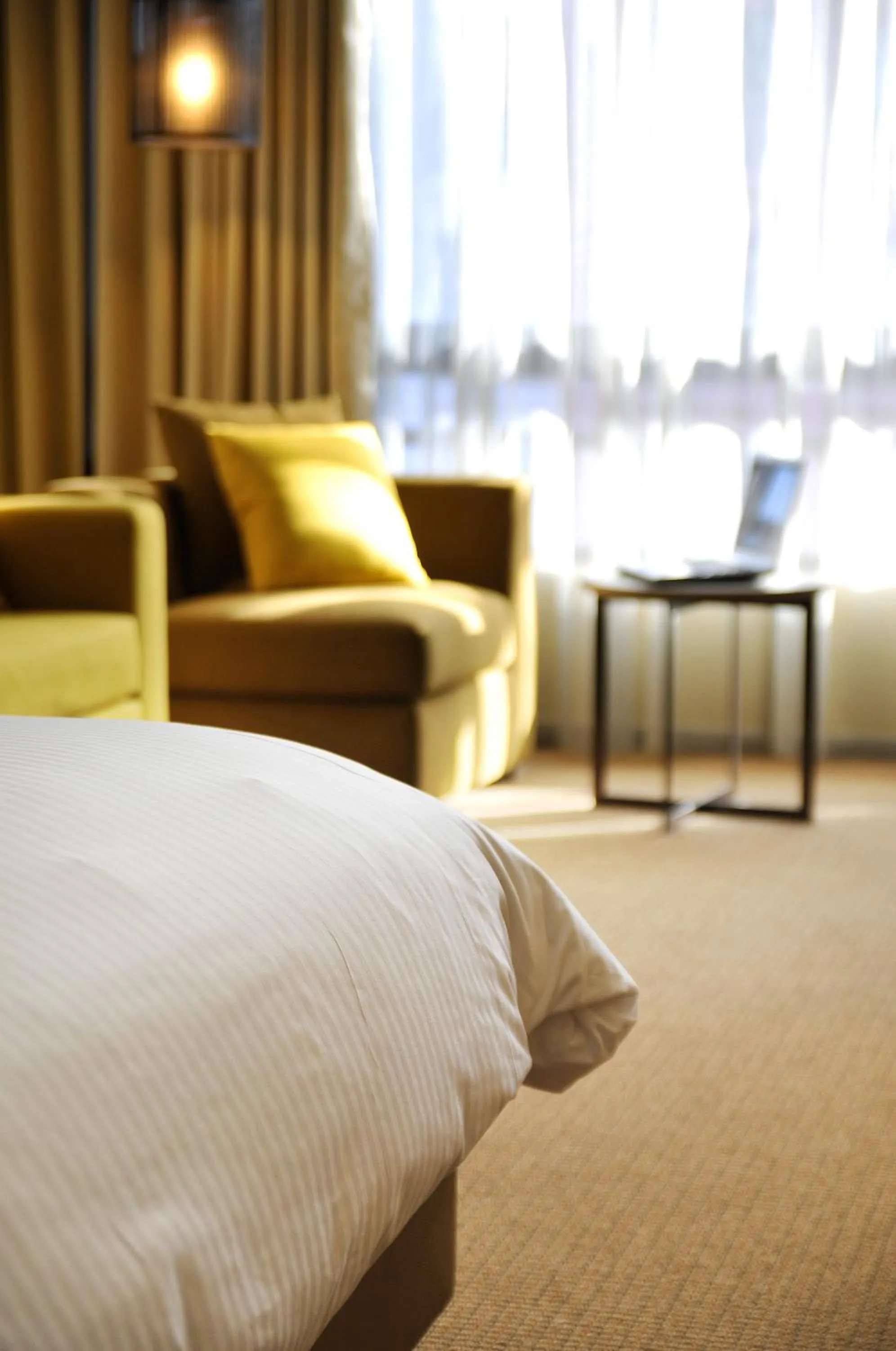 Seating area, Bed in Academy Hotel