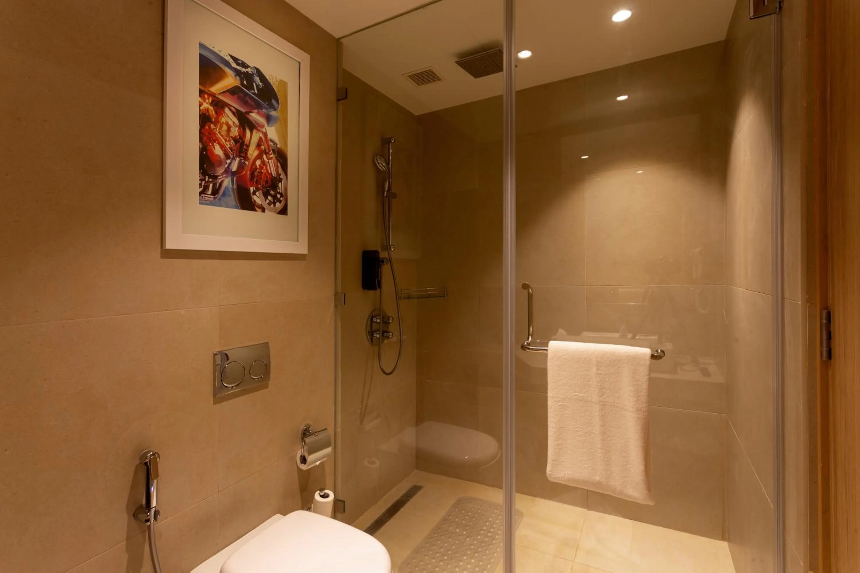 Bathroom in Holiday Inn Express & Suites Bengaluru Old Madras Road by IHG