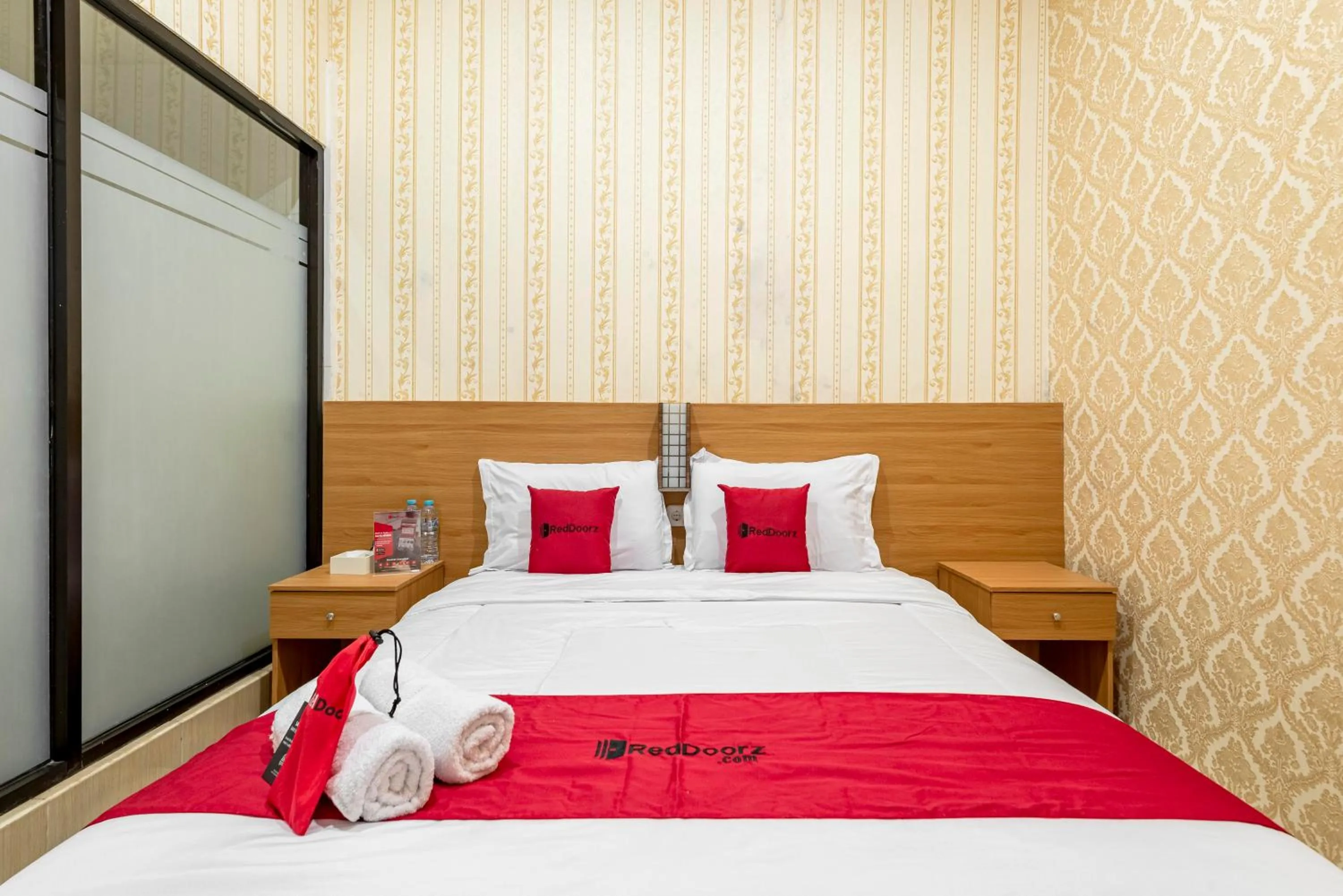 Bed in RedDoorz Syariah @ Danau Kerinci Sawojajar