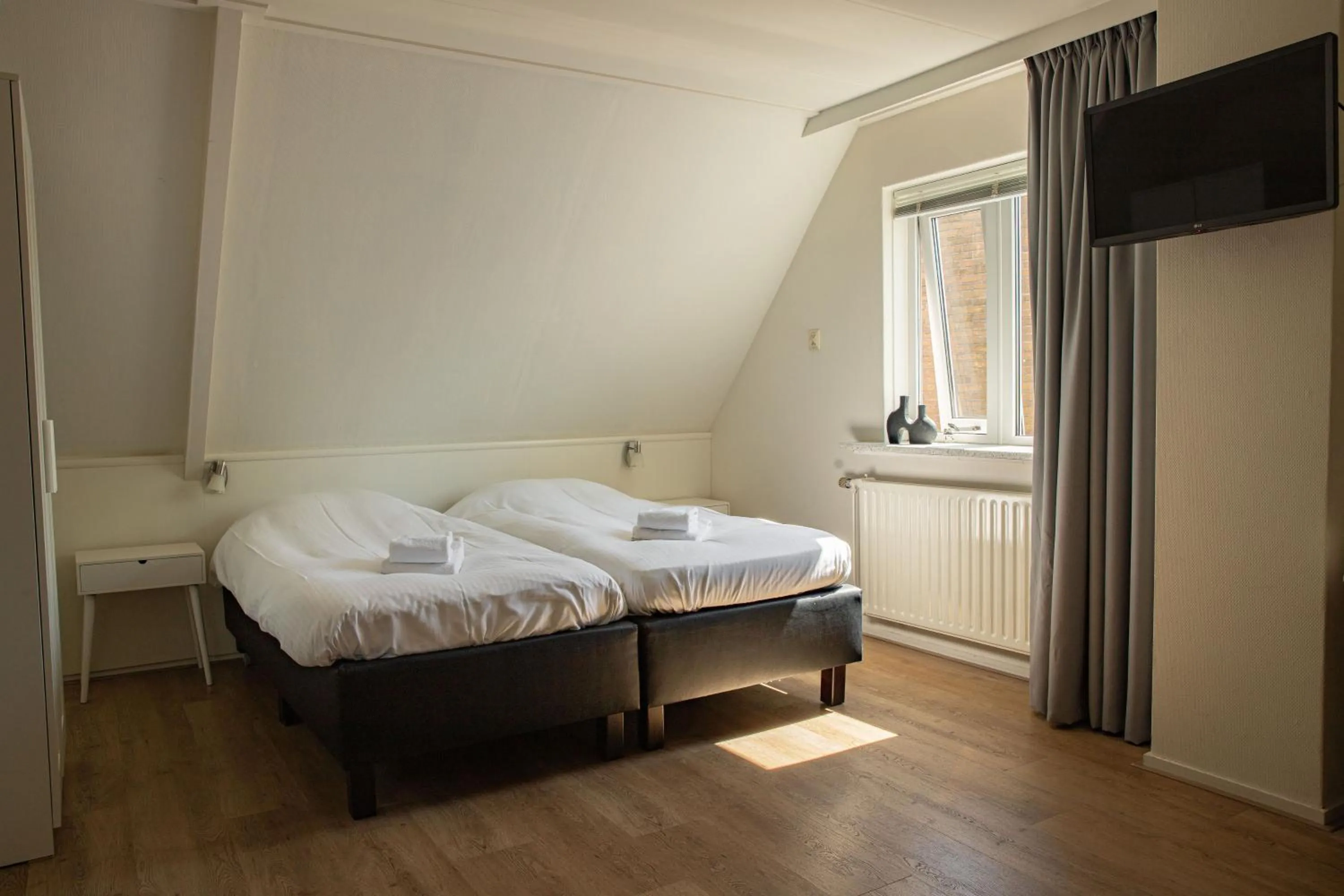 Bed in Hotel-Restaurant De Walvisvaarder