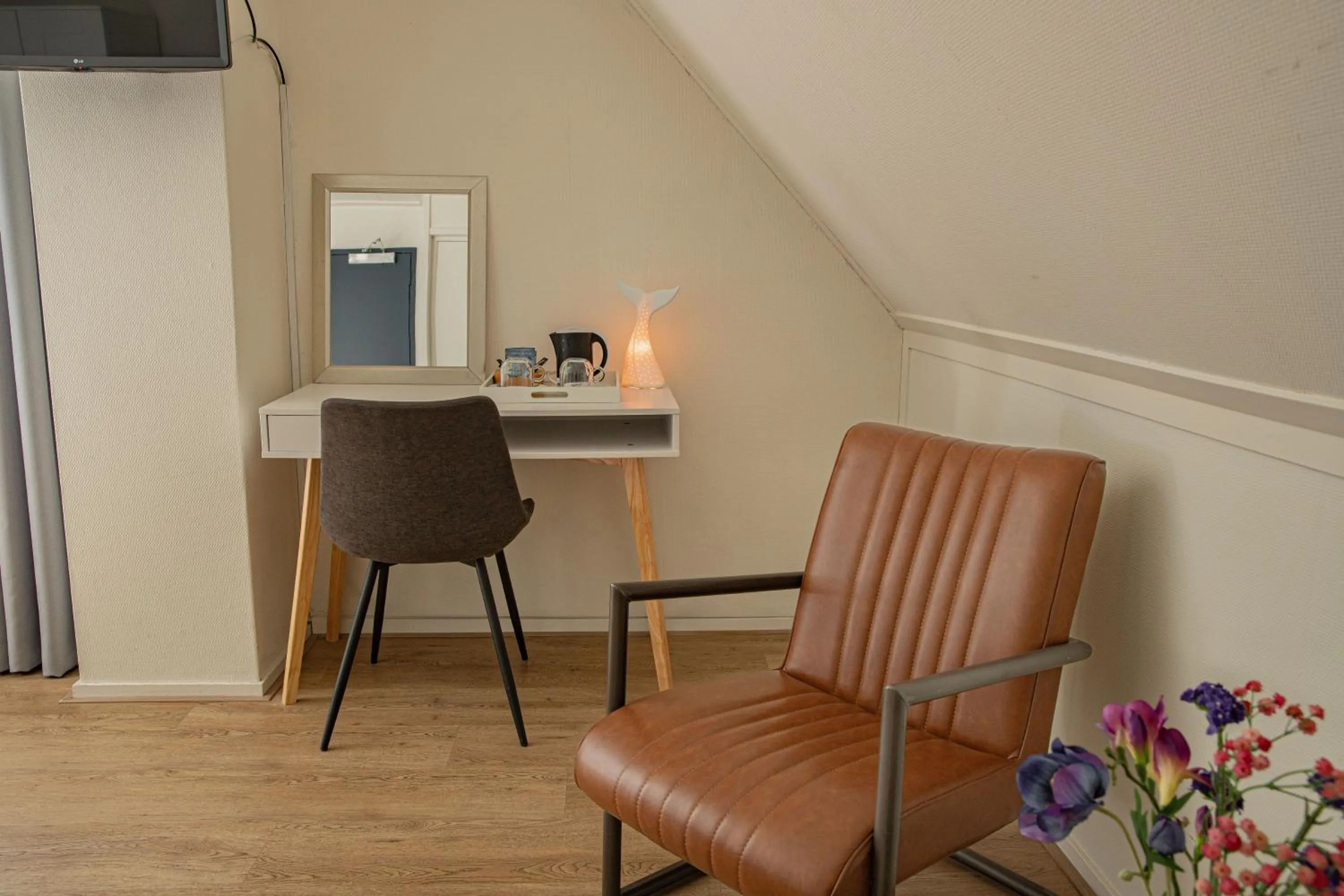 Seating area in Hotel-Restaurant De Walvisvaarder