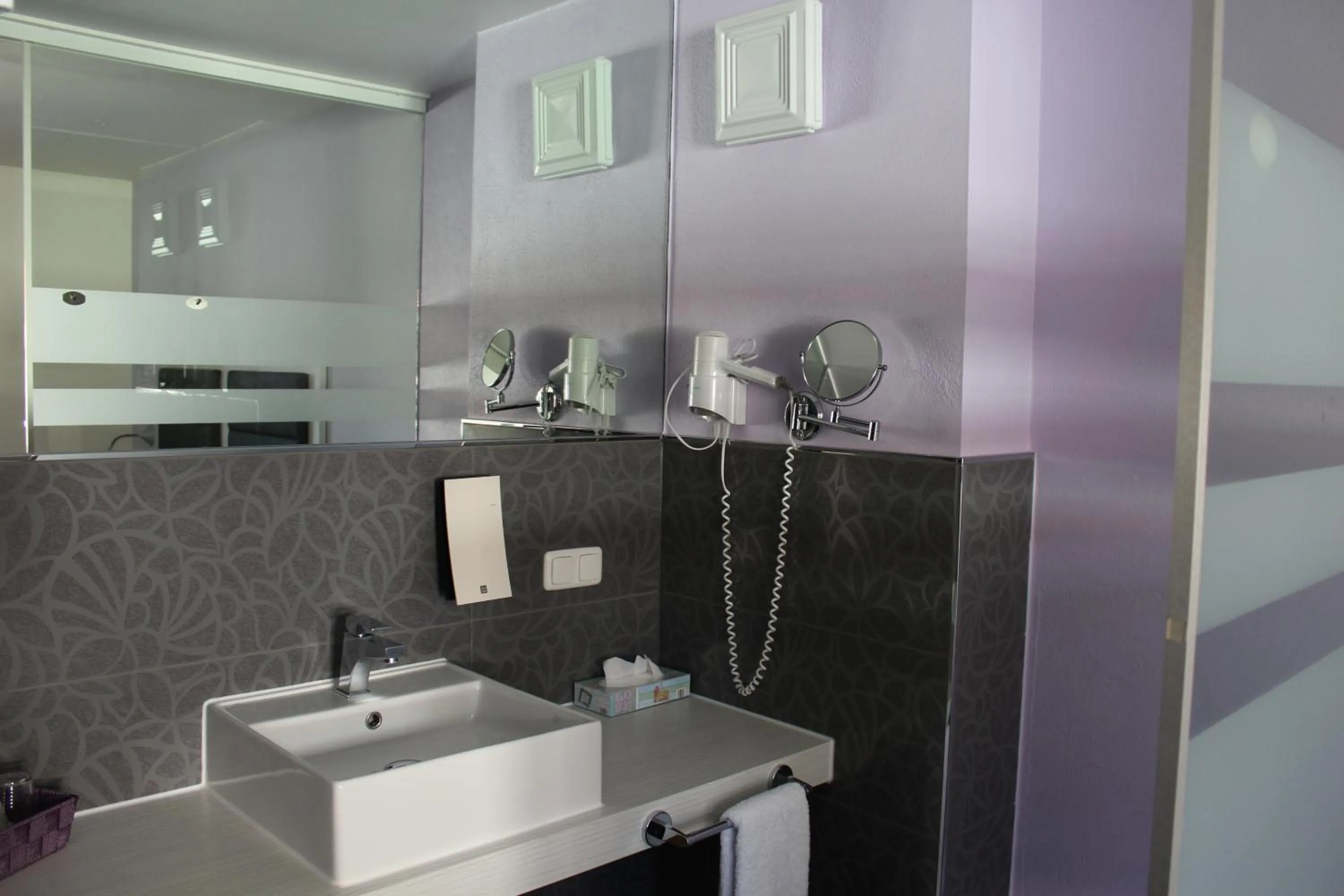 Bathroom in Amiga Hotel München Messe