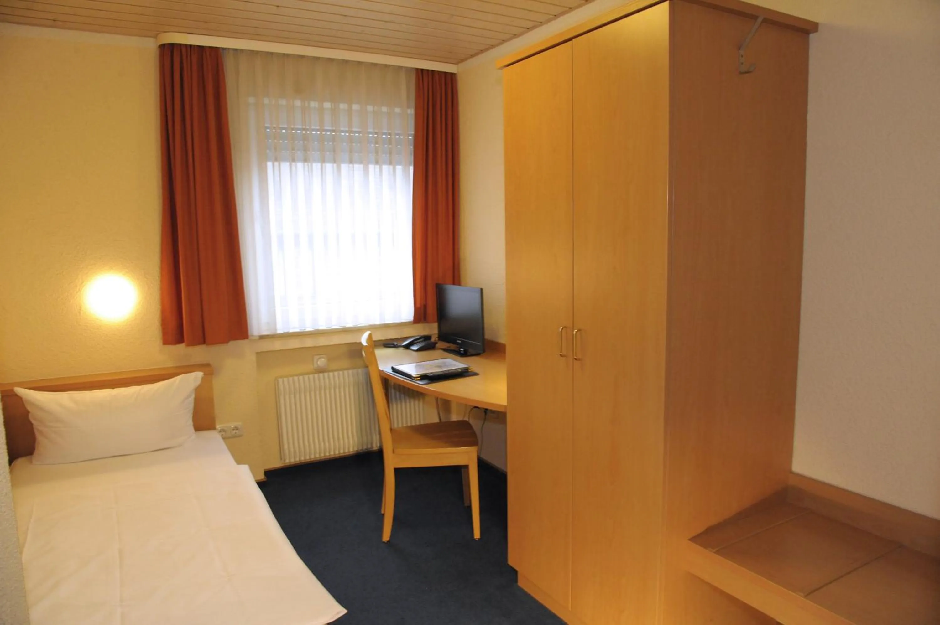 Photo of the whole room, Bed in Hotel Goldener Karpfen