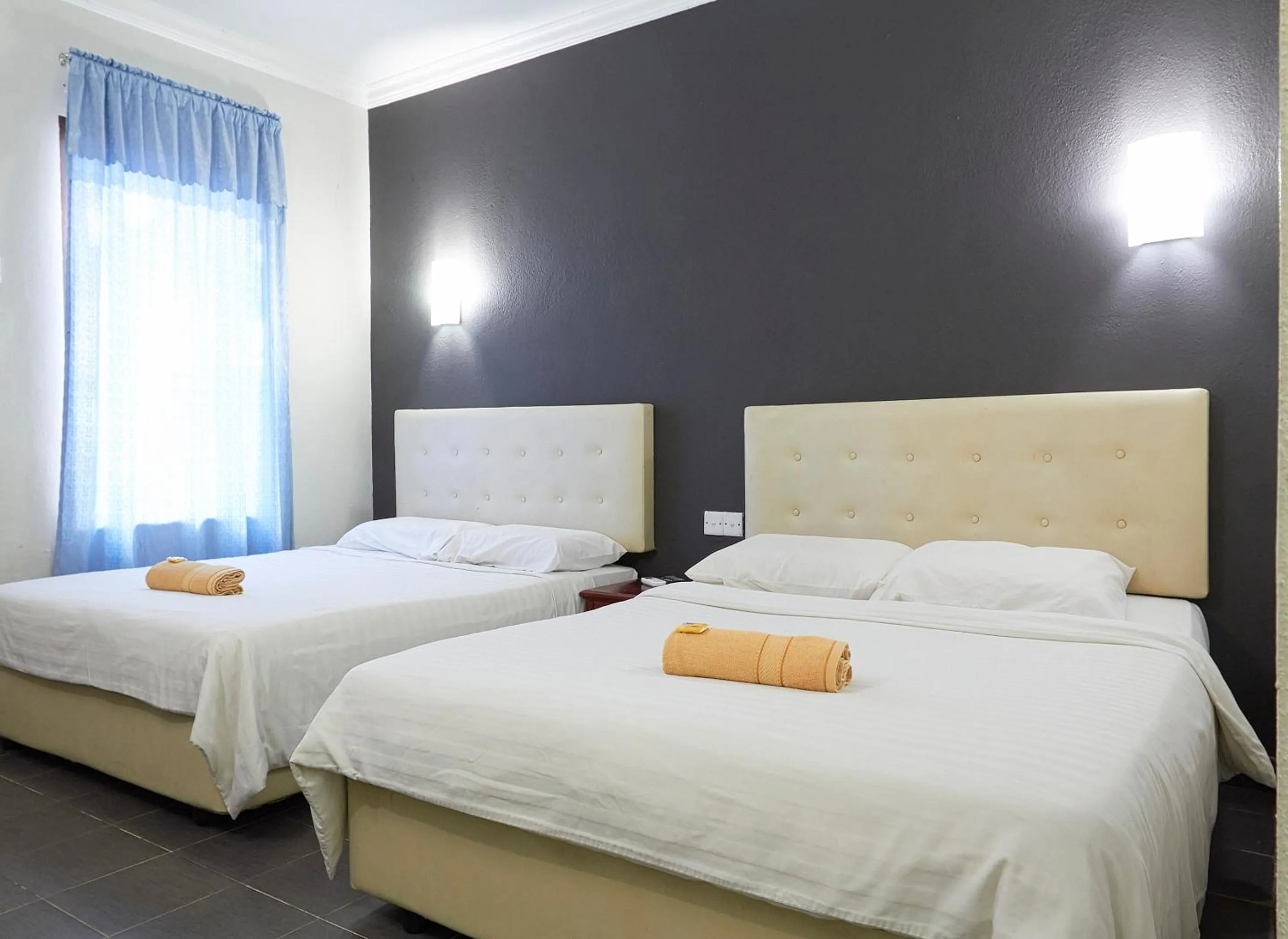 Bed in Corrie Chalet Pantai Cenang Langkawi