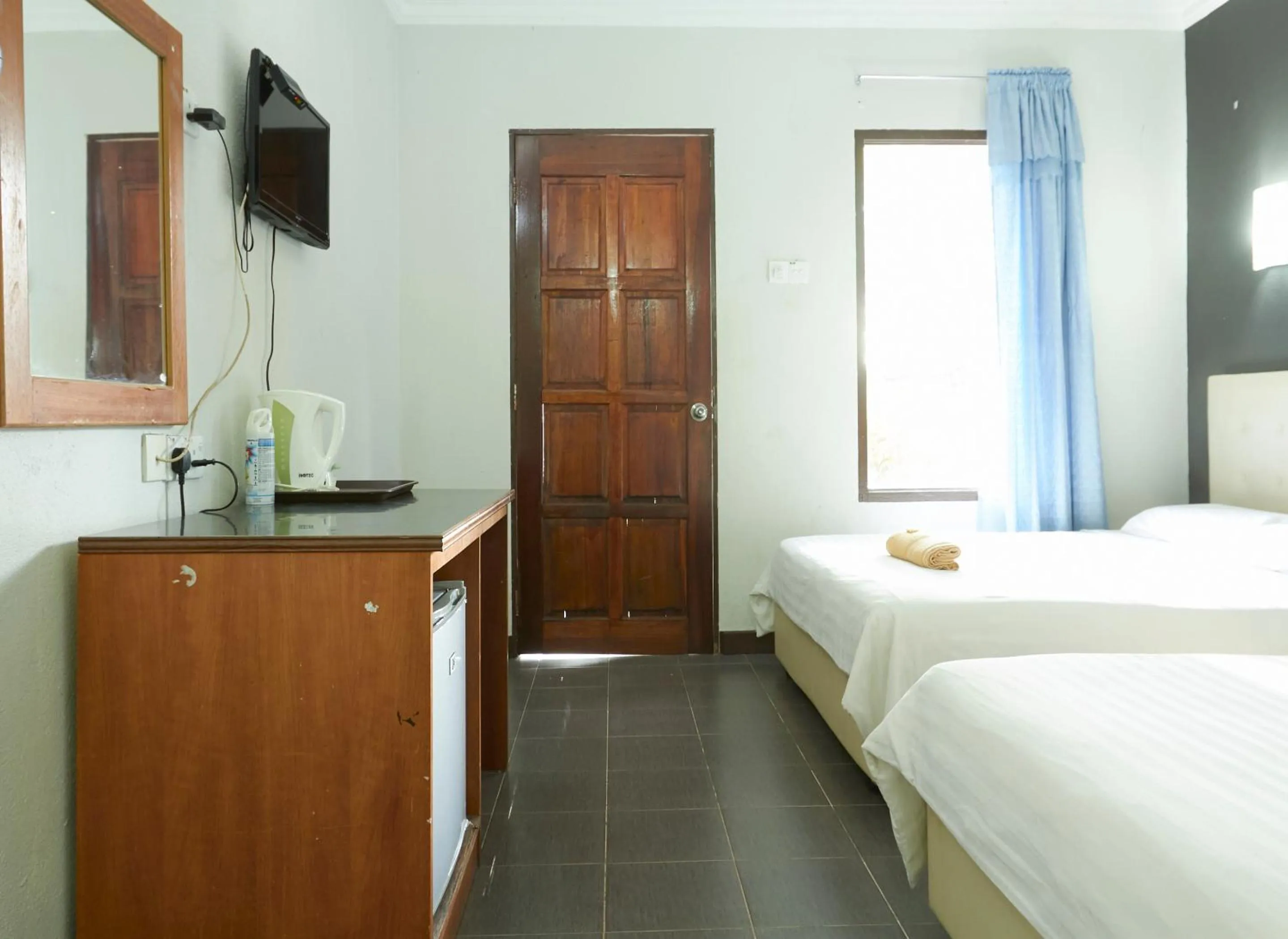 Bed in Corrie Chalet Pantai Cenang Langkawi