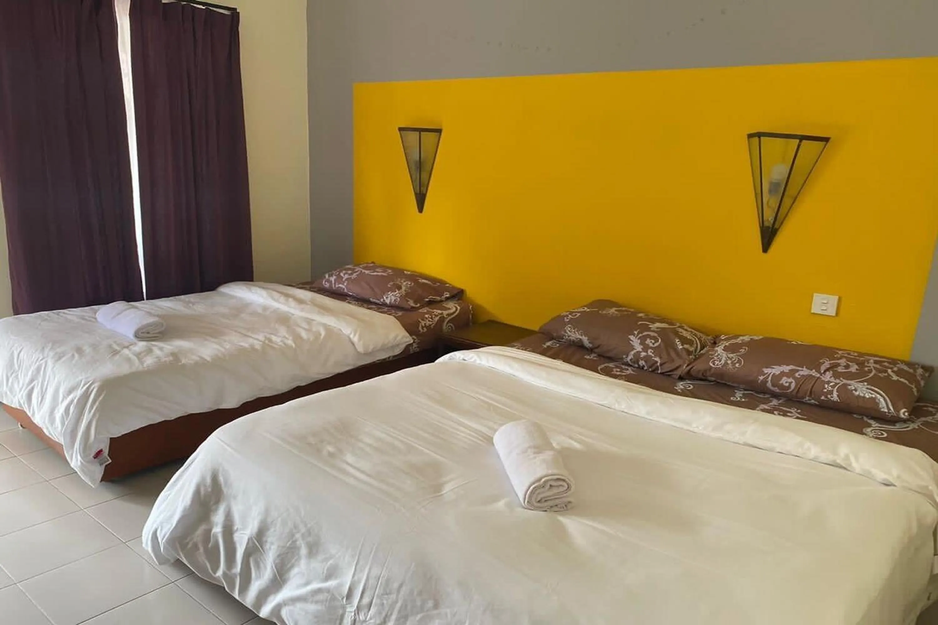 Bed in Corrie Chalet Pantai Cenang Langkawi