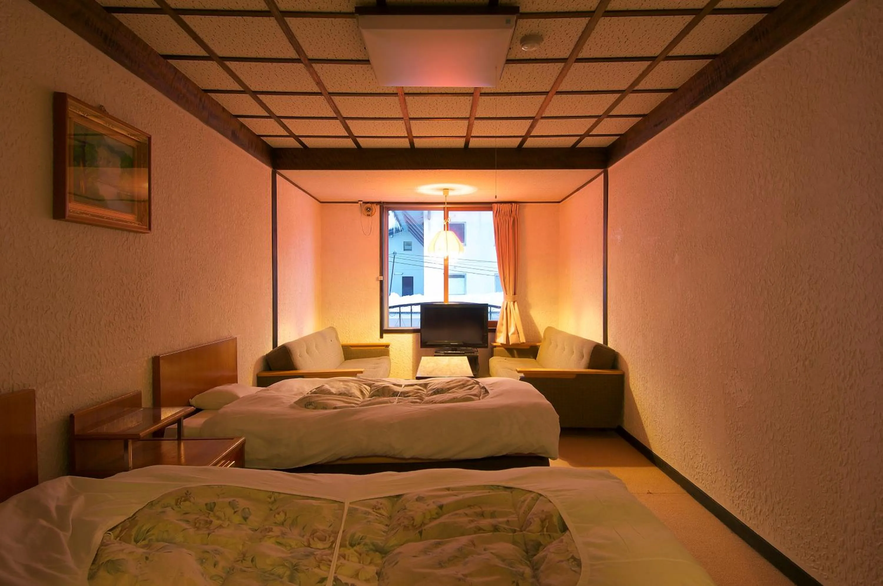 View (from property/room), Bed in Hotel Sanraku