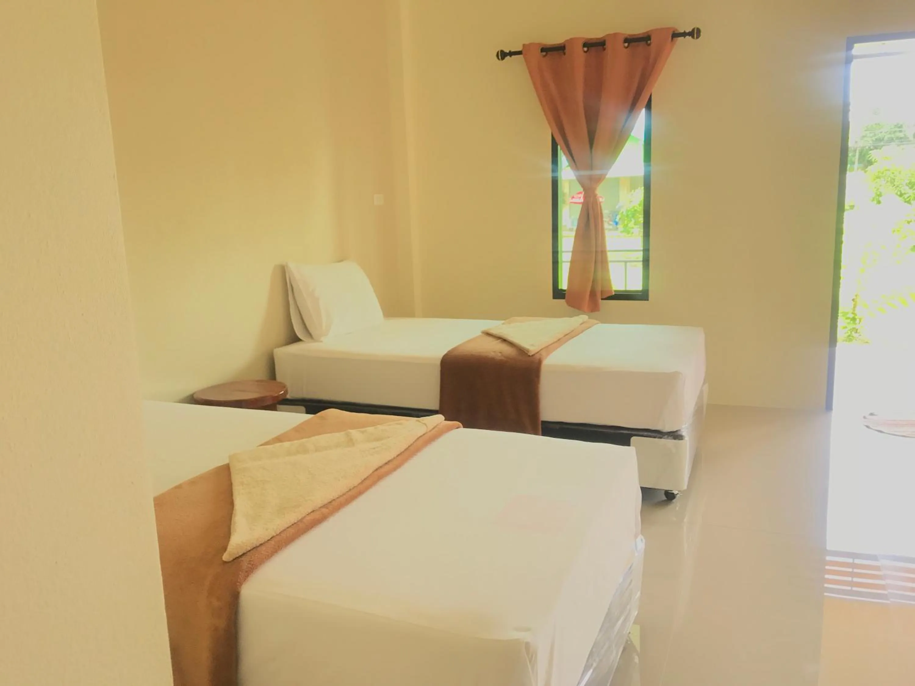 Bed in Sangtong Beach Resort