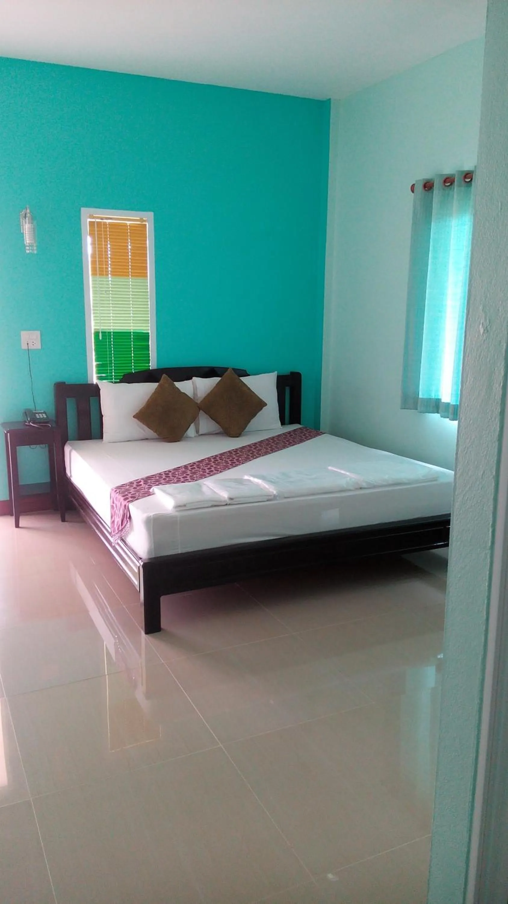 Bed in Sangtong Beach Resort