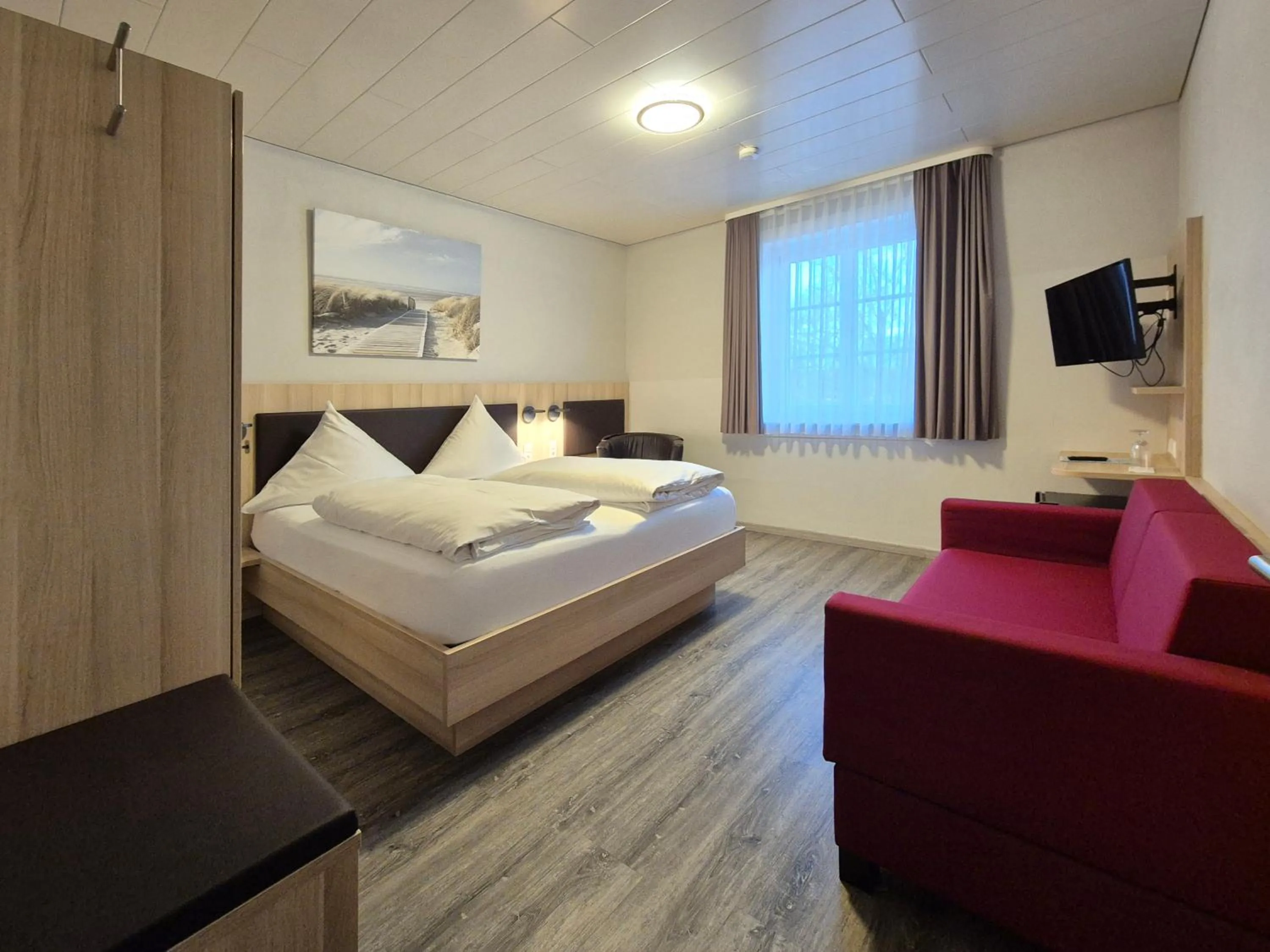 Bed in Hotel Mäuerle