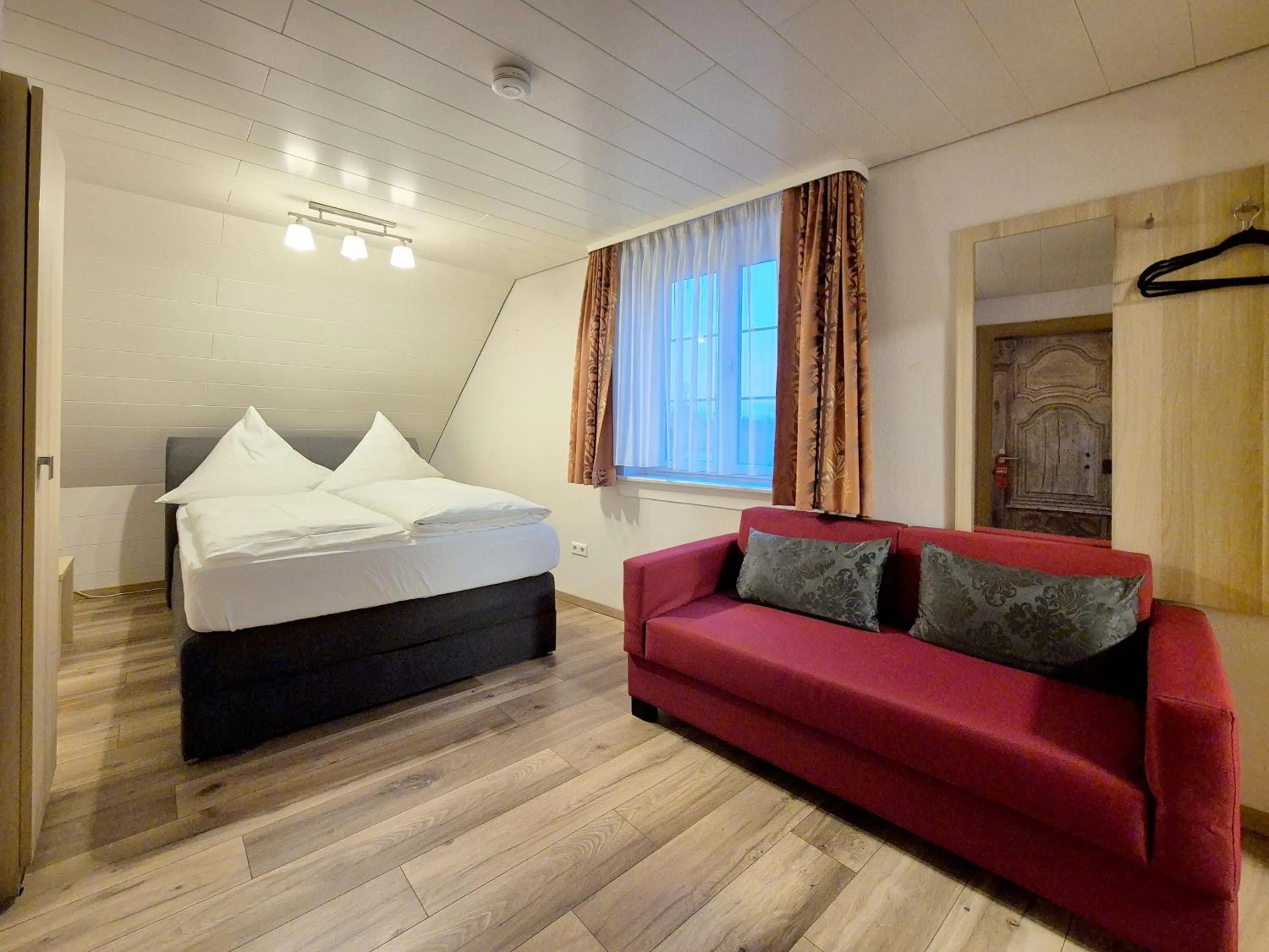 Bed in Hotel Mäuerle