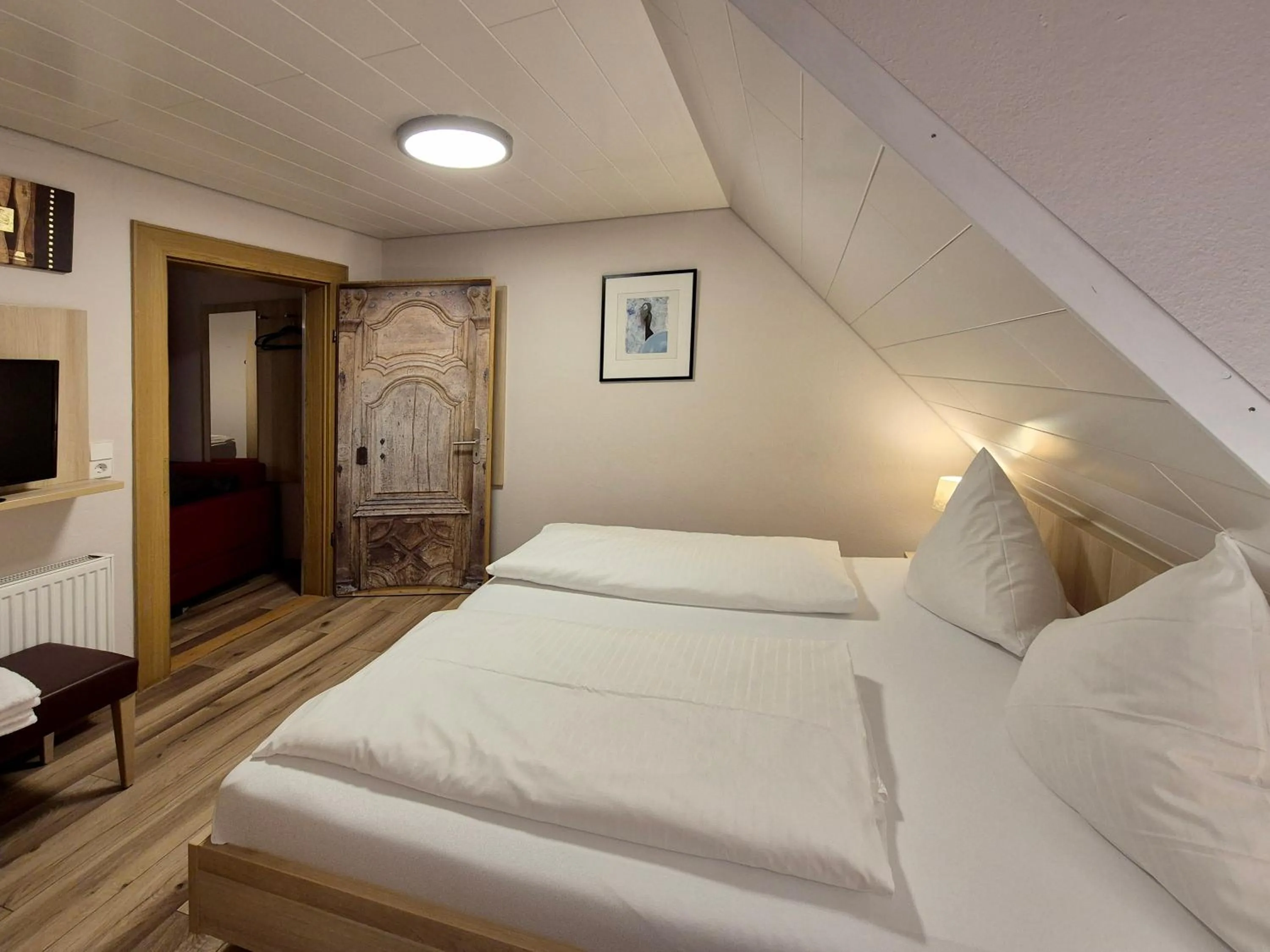 Bed in Hotel Mäuerle