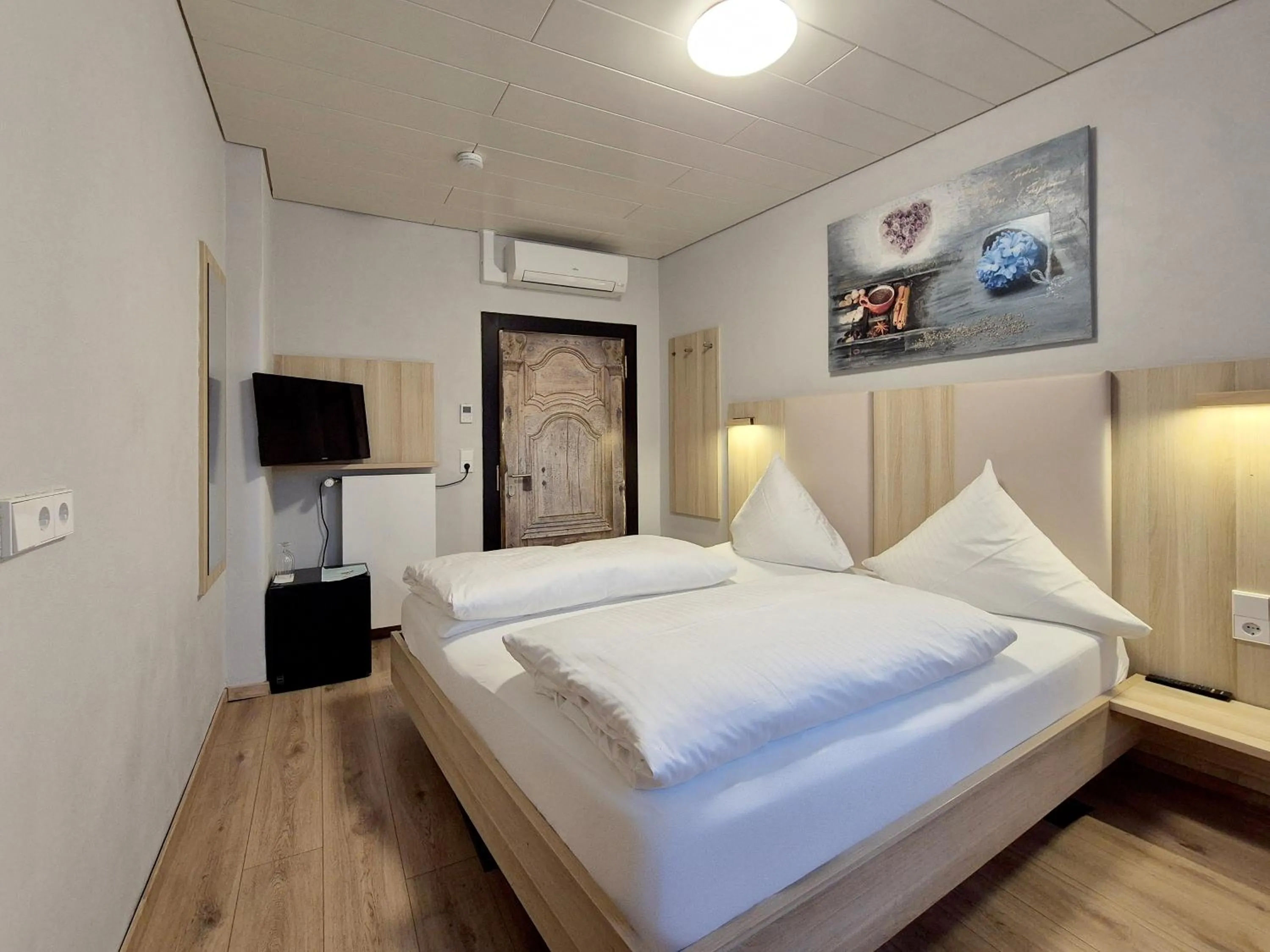 Bed in Hotel Mäuerle