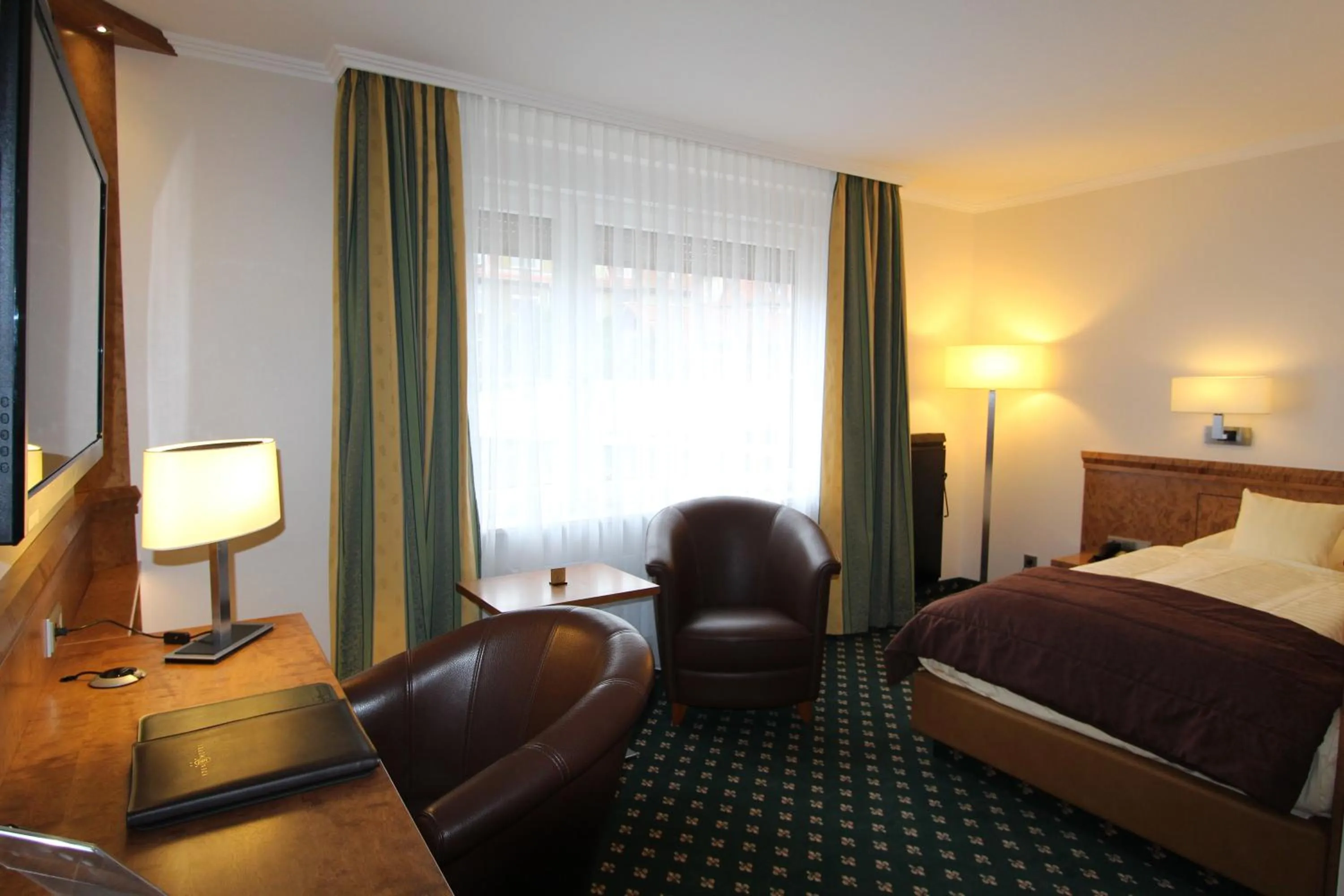 Photo of the whole room, Bed in Eden-Hotel