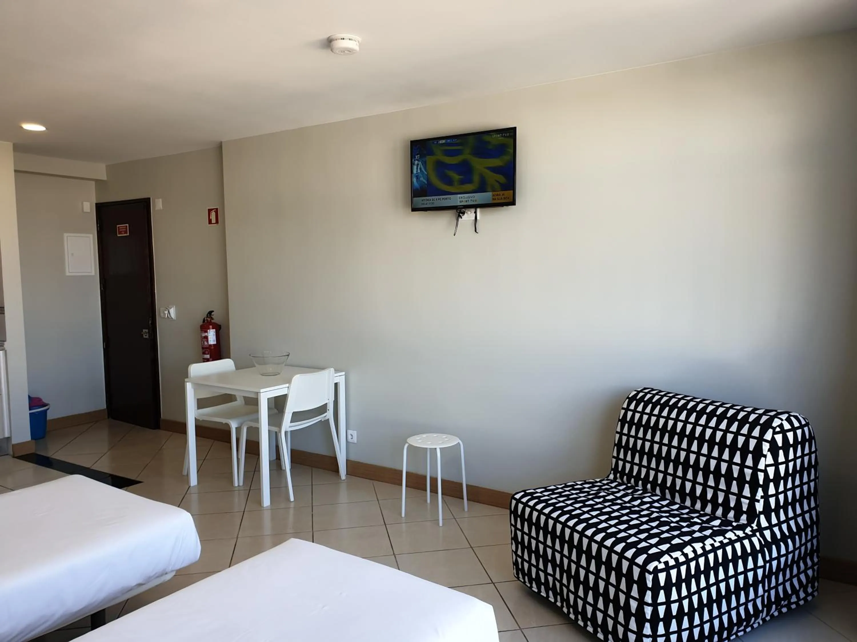 Living room, Bed in Tarik by Atlantichotels - AL