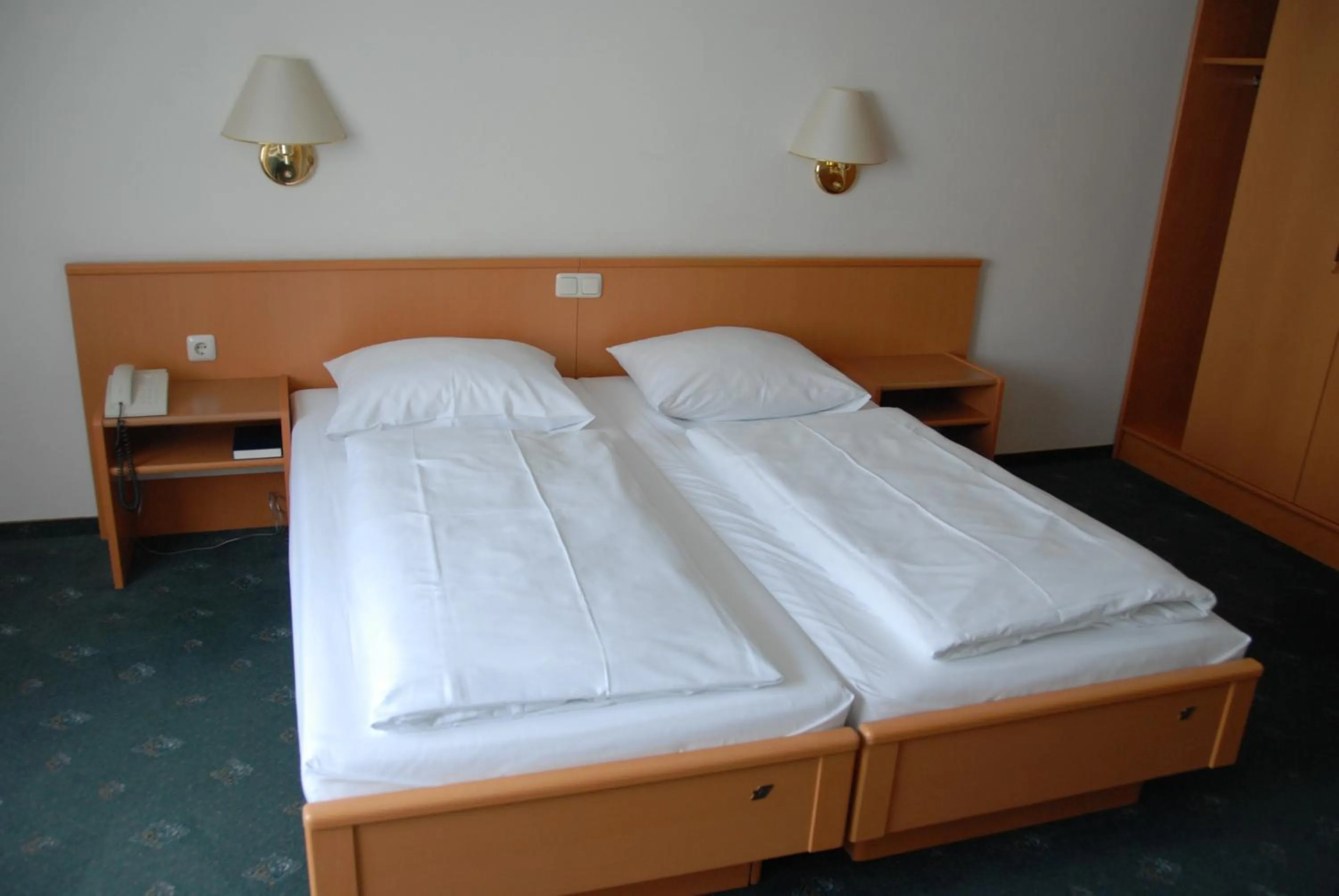 Bedroom, Bed in Hotel Bitburg