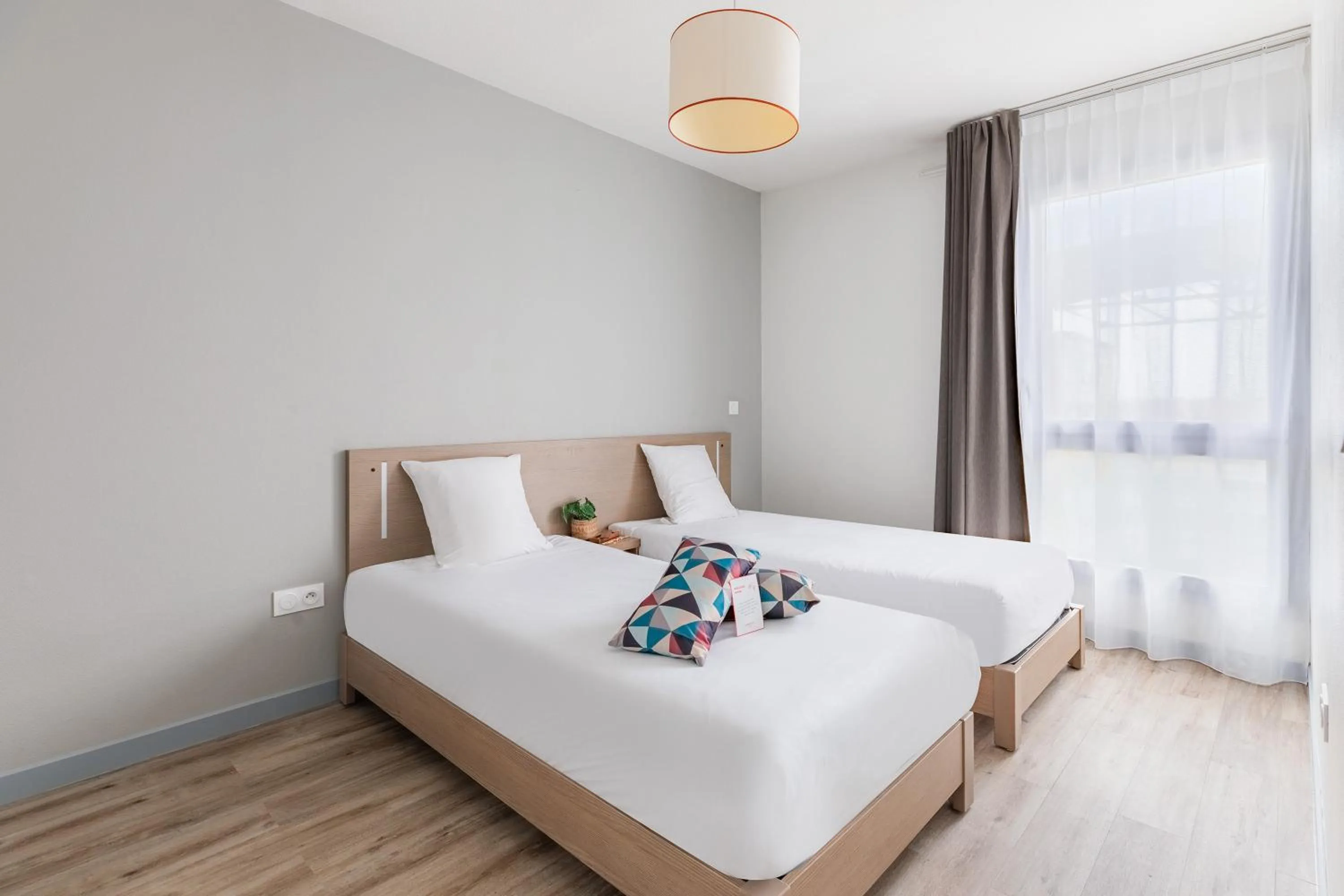 Bed in Appart'City Confort Perpignan Centre Gare