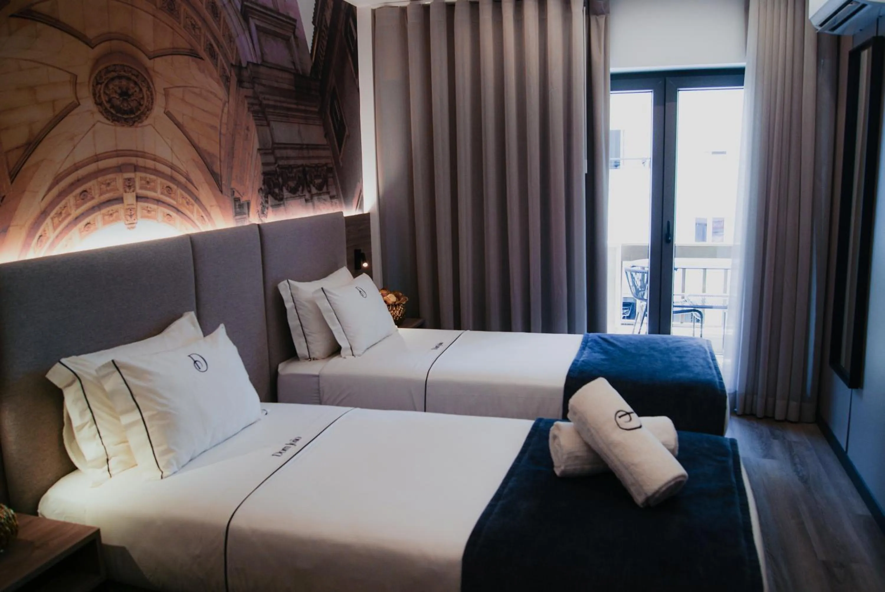 Bed in Dom João Glamour Hotel