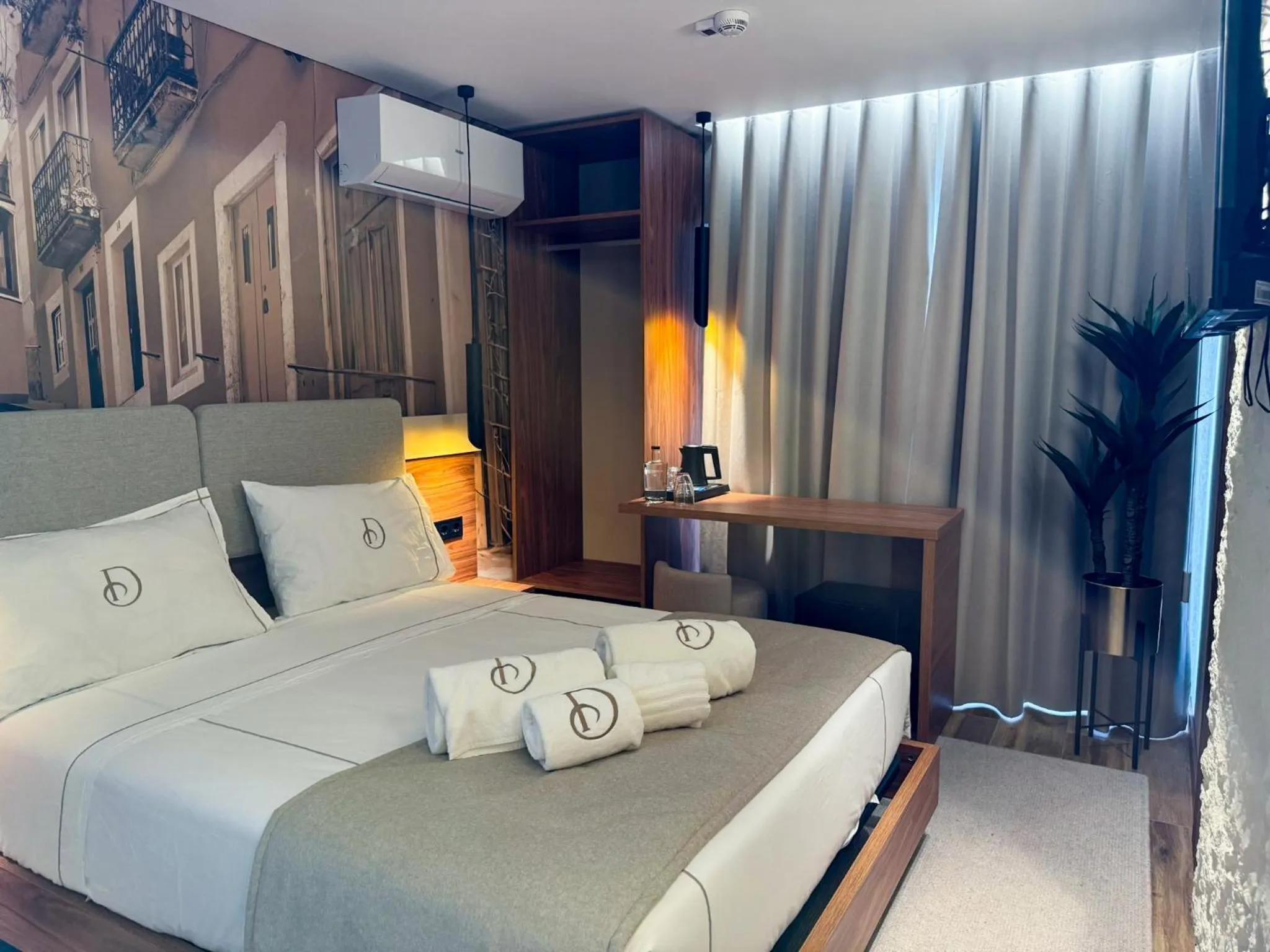 Bed in Dom João Glamour Hotel