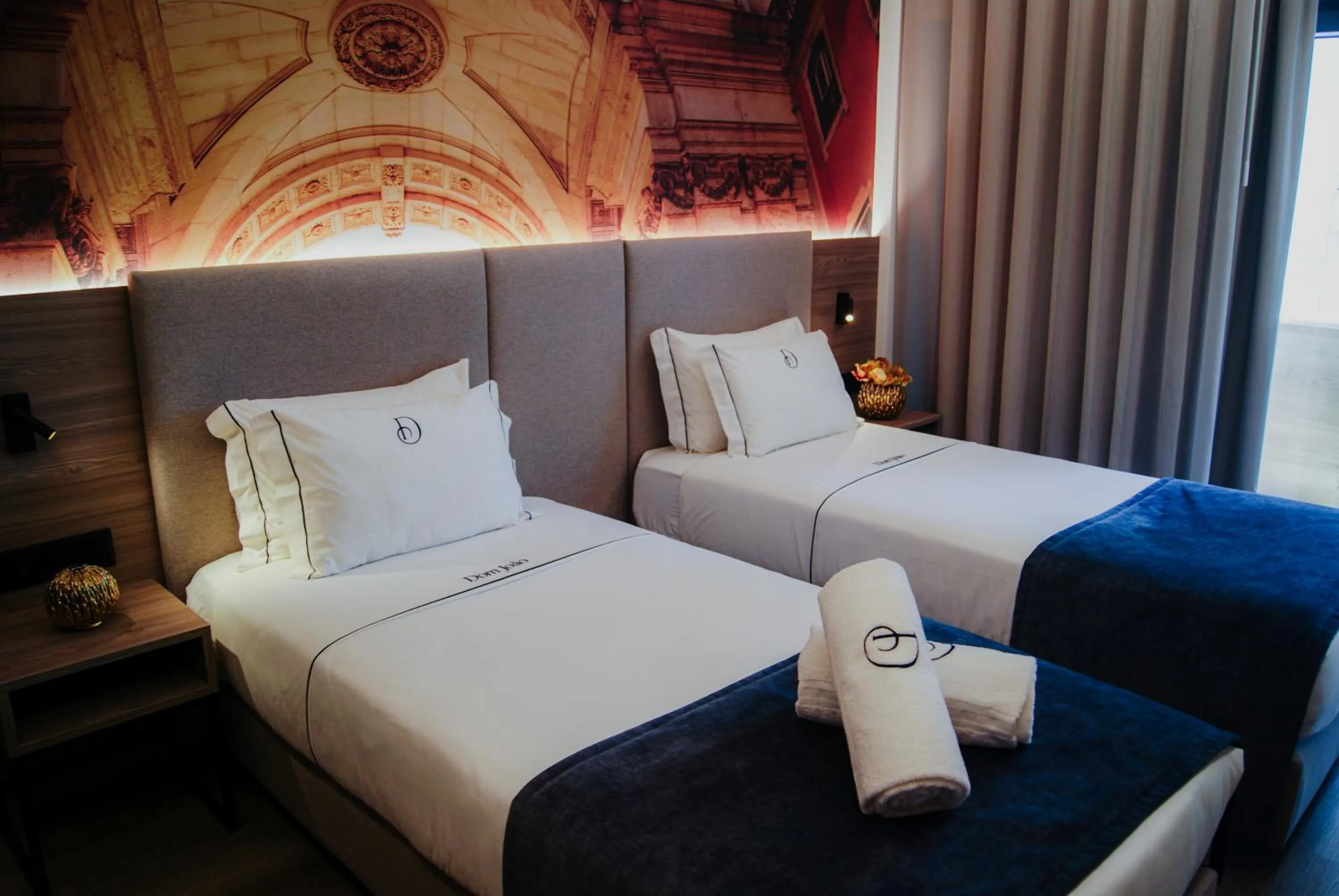 Bed in Dom João Glamour Hotel