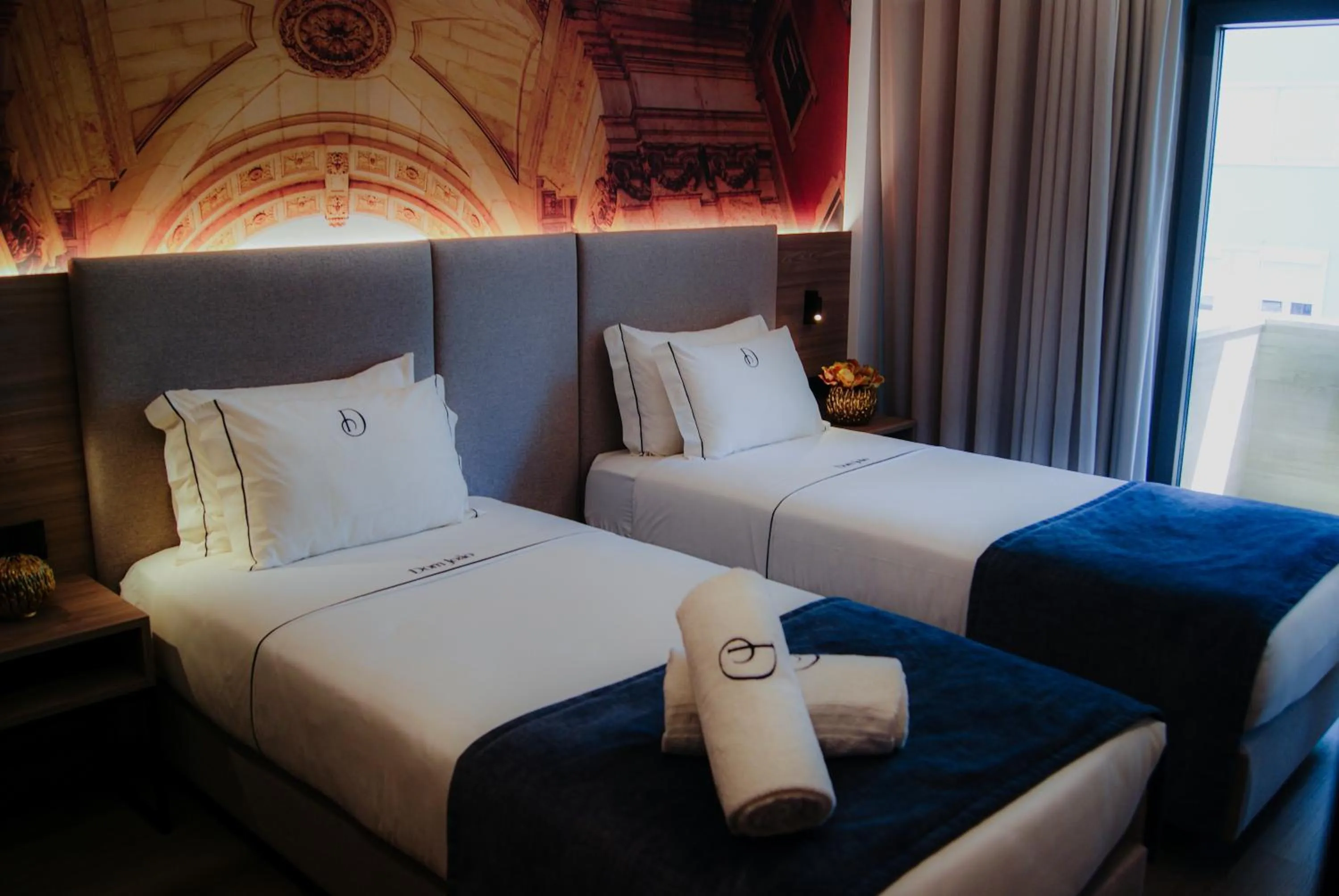 Bed in Dom João Glamour Hotel