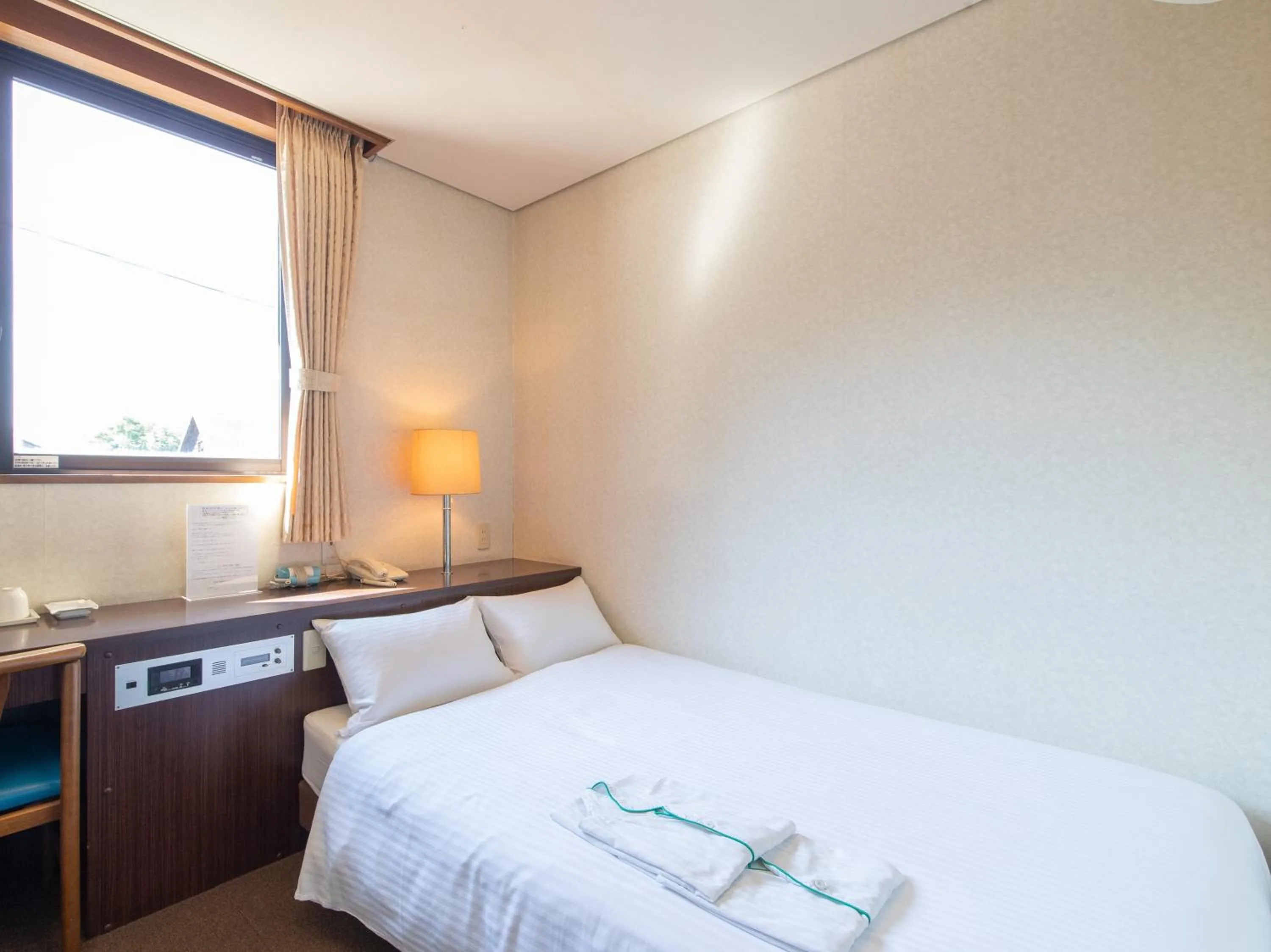 Photo of the whole room, Bed in Tabist Business Hotel Fujiya