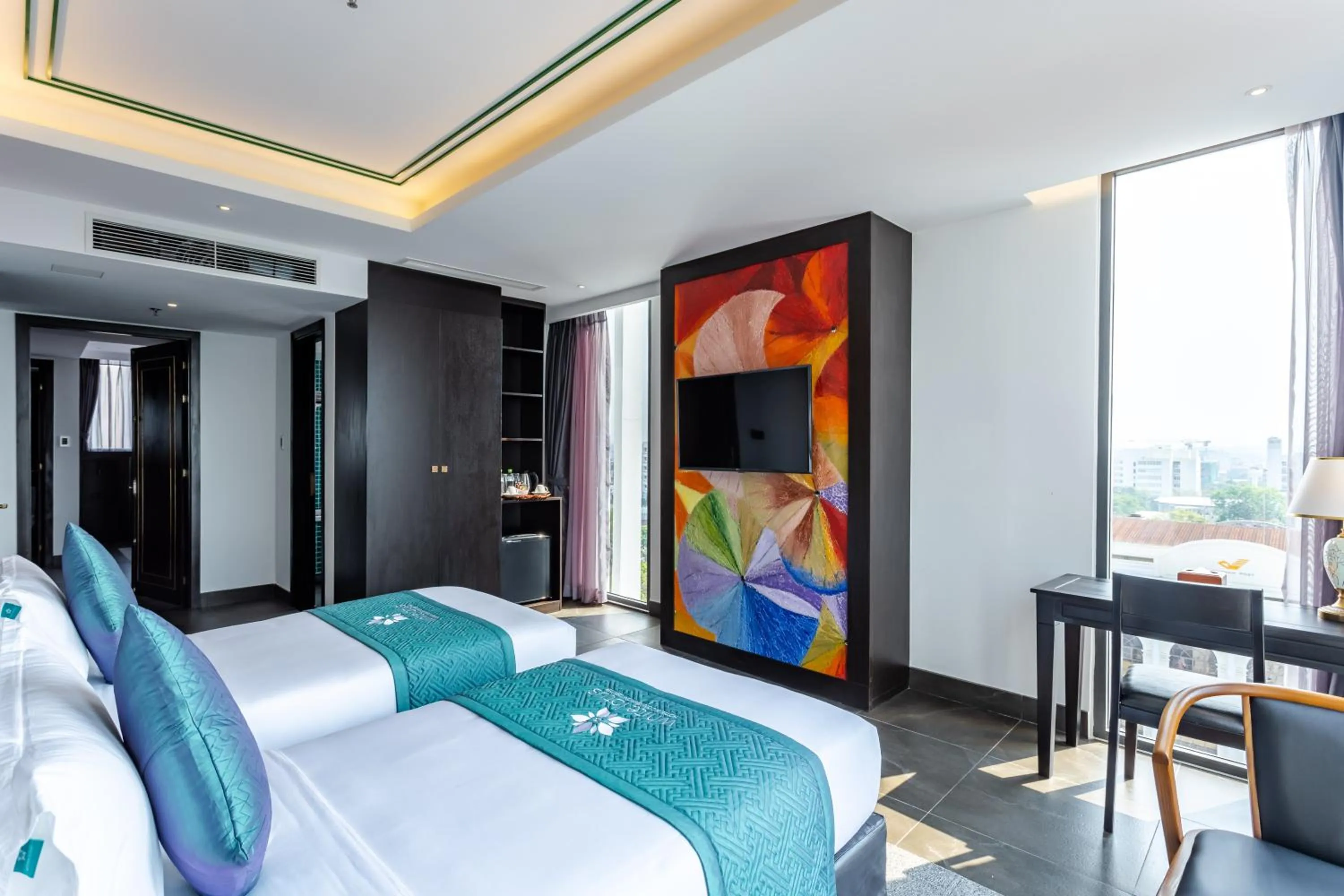 Photo of the whole room, Bed in White Lotus Hue Hotel