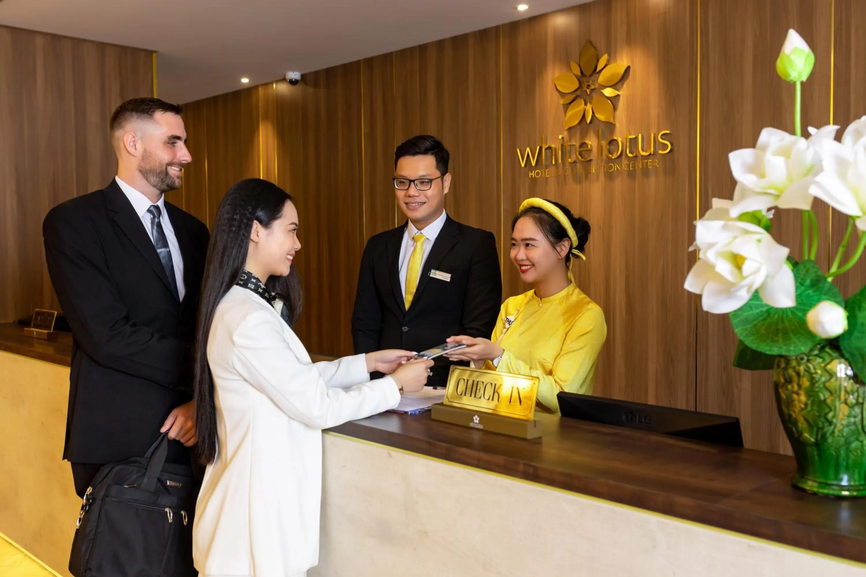 Staff in White Lotus Hue Hotel
