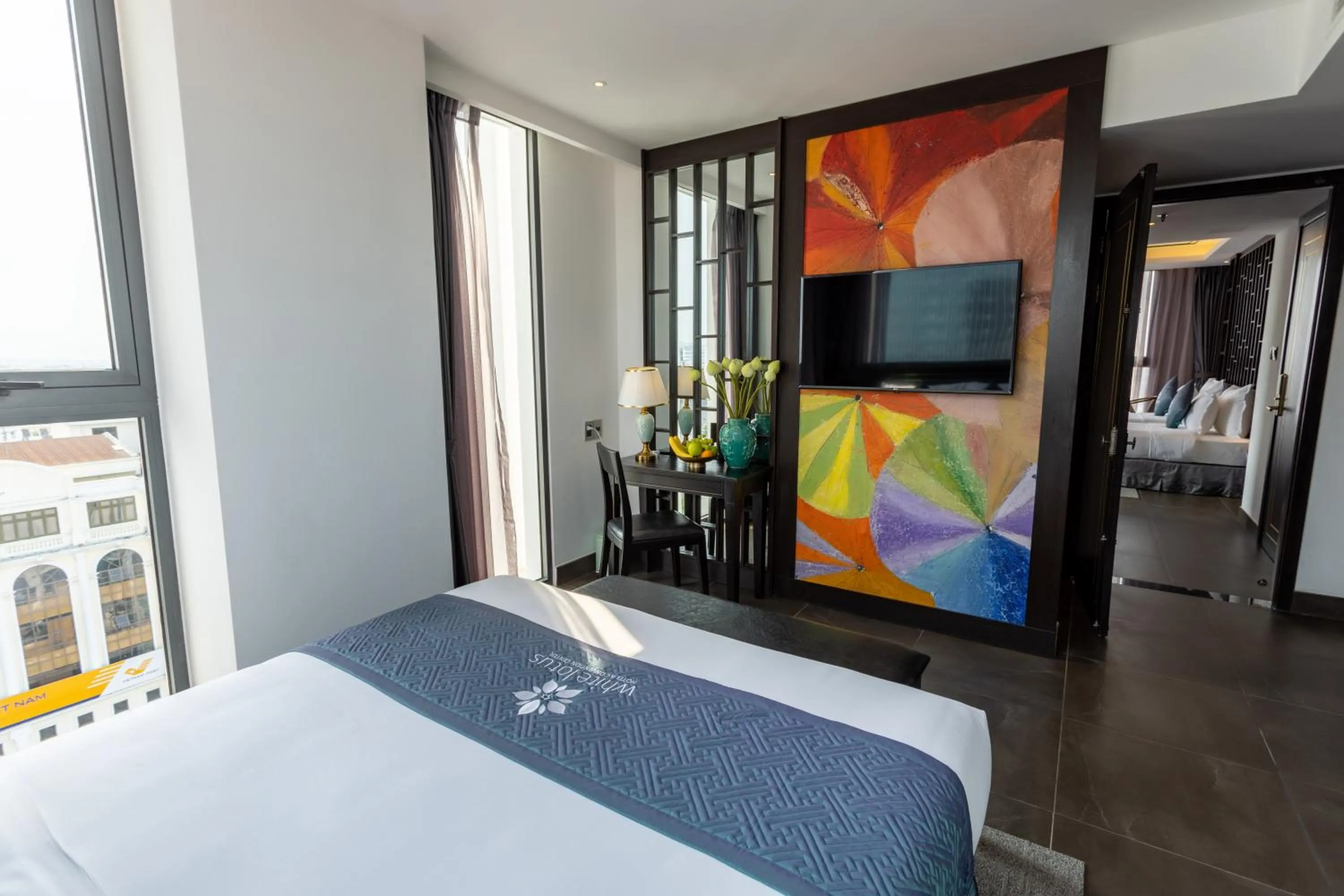 Photo of the whole room, Bed in White Lotus Hue Hotel