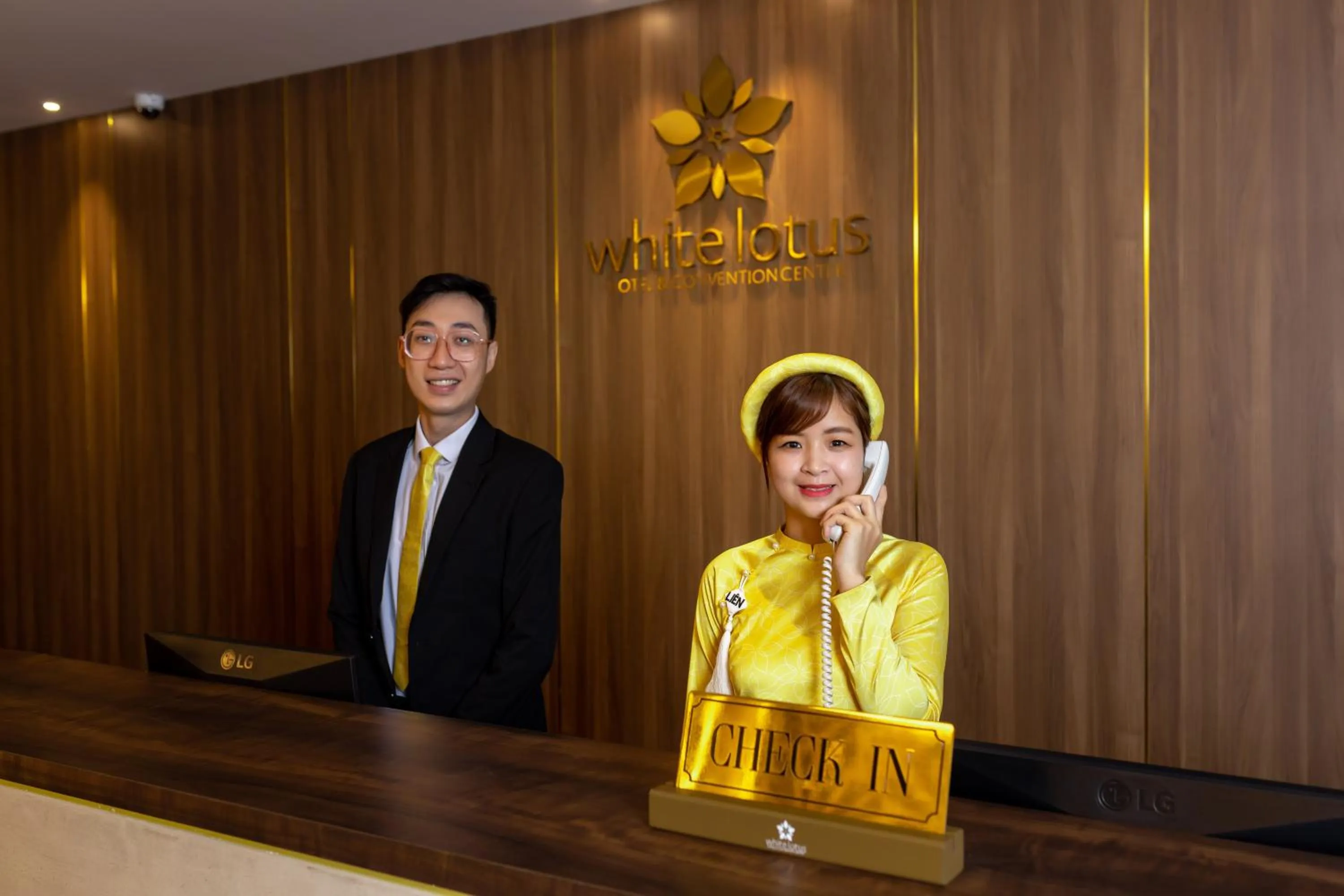Staff in White Lotus Hue Hotel