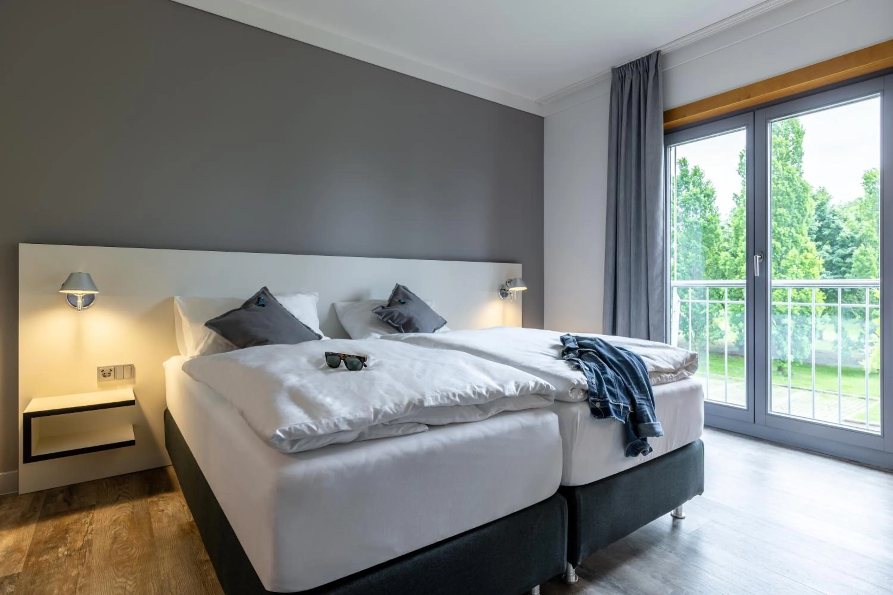 Photo of the whole room, Bed in Coffee Fellows Hotel Leipheim Süd