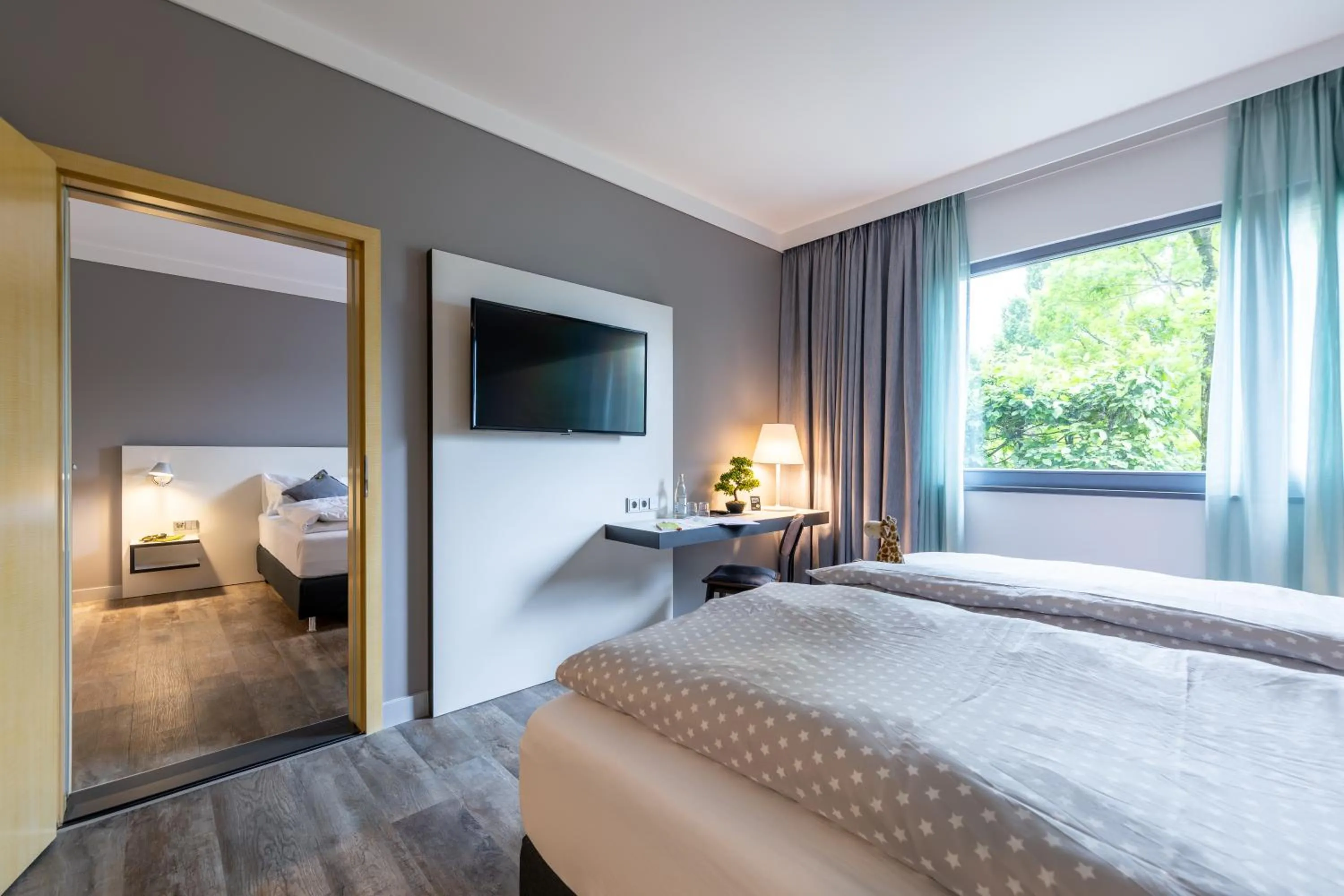 Photo of the whole room, Bed in Coffee Fellows Hotel Leipheim Süd