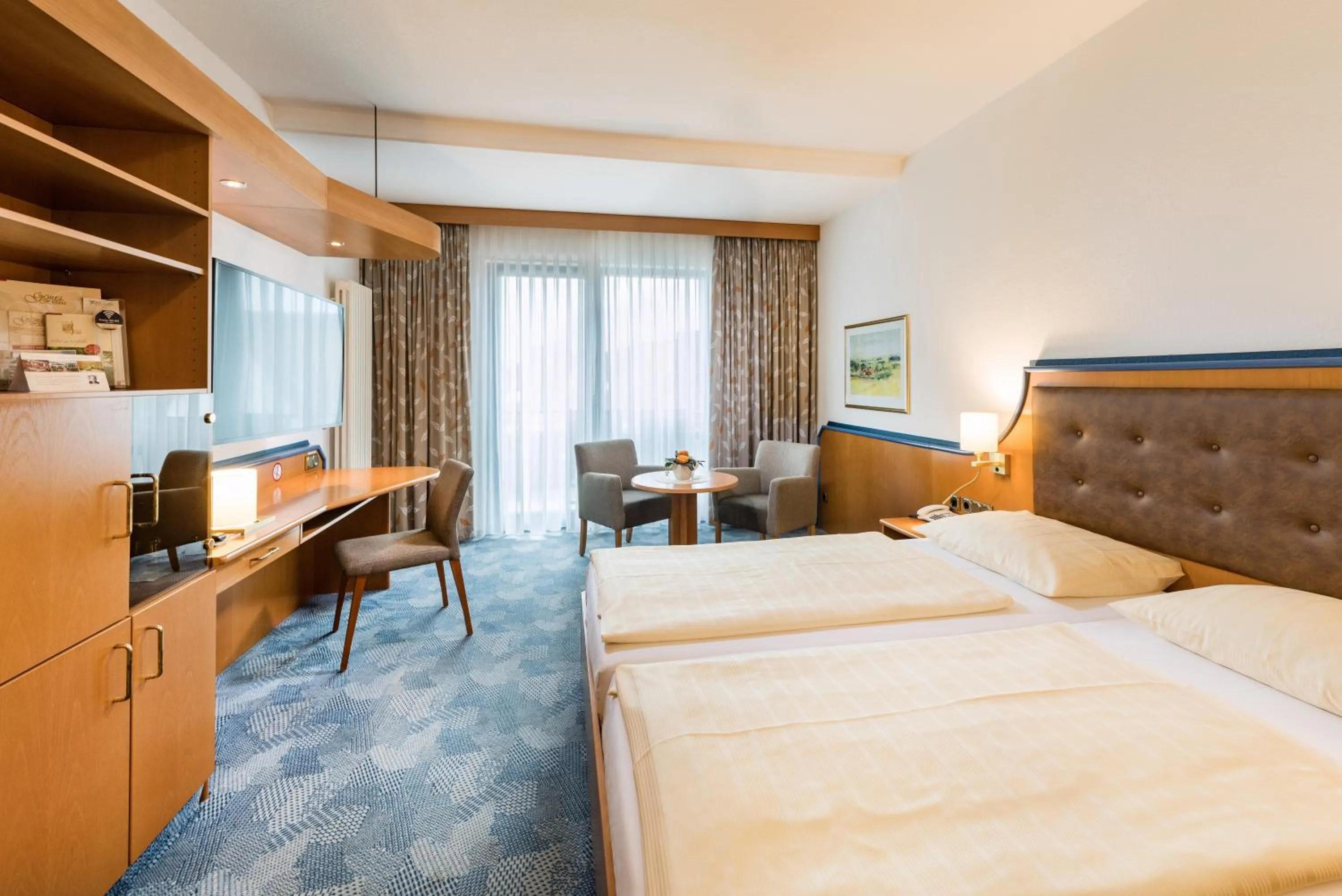 Photo of the whole room, Bed in Posthotel Rotenburg