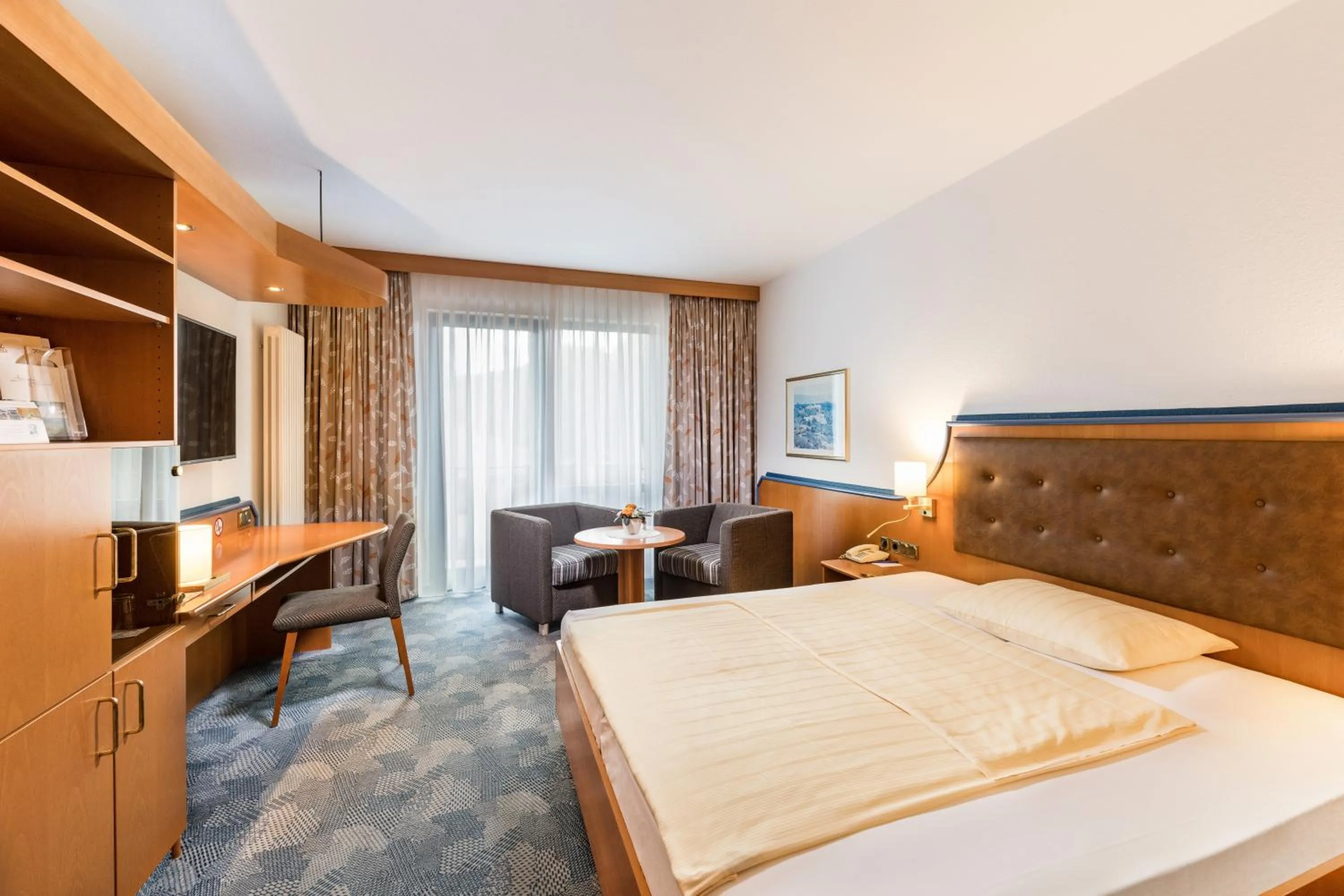 Photo of the whole room, Bed in Posthotel Rotenburg