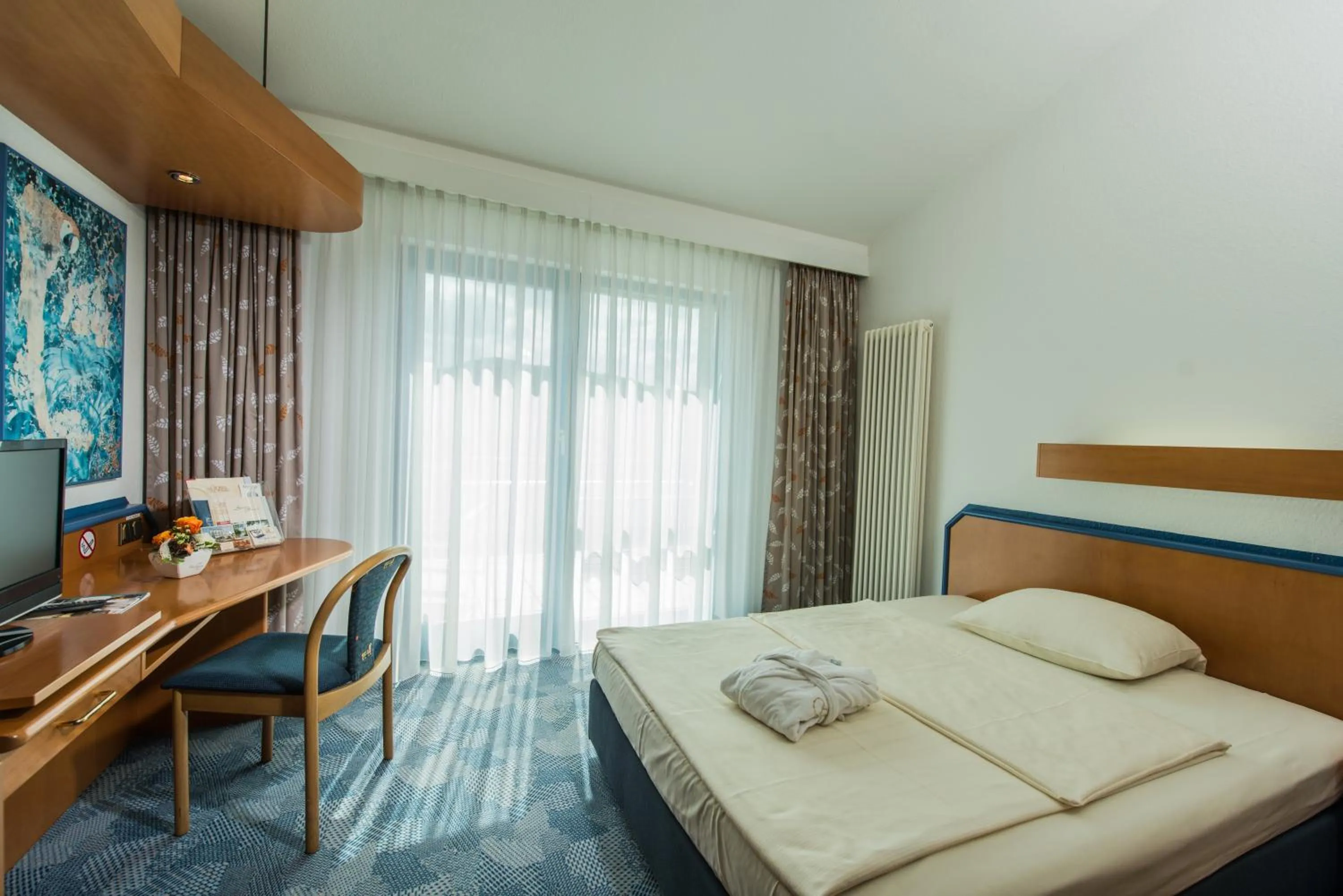 Photo of the whole room, Bed in Posthotel Rotenburg