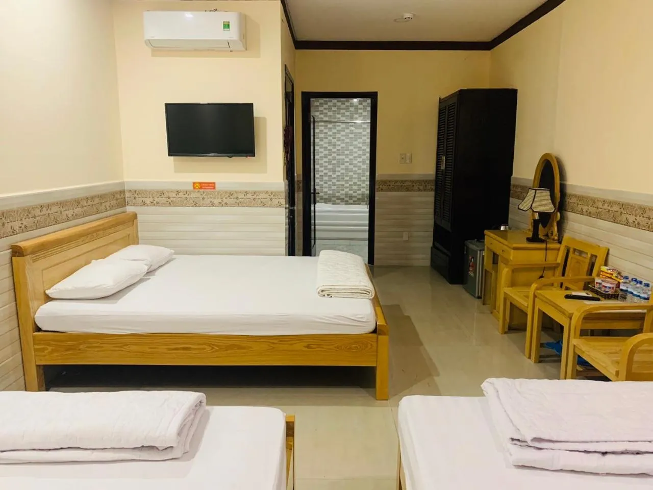 Bed in Mekong Rose Hotel