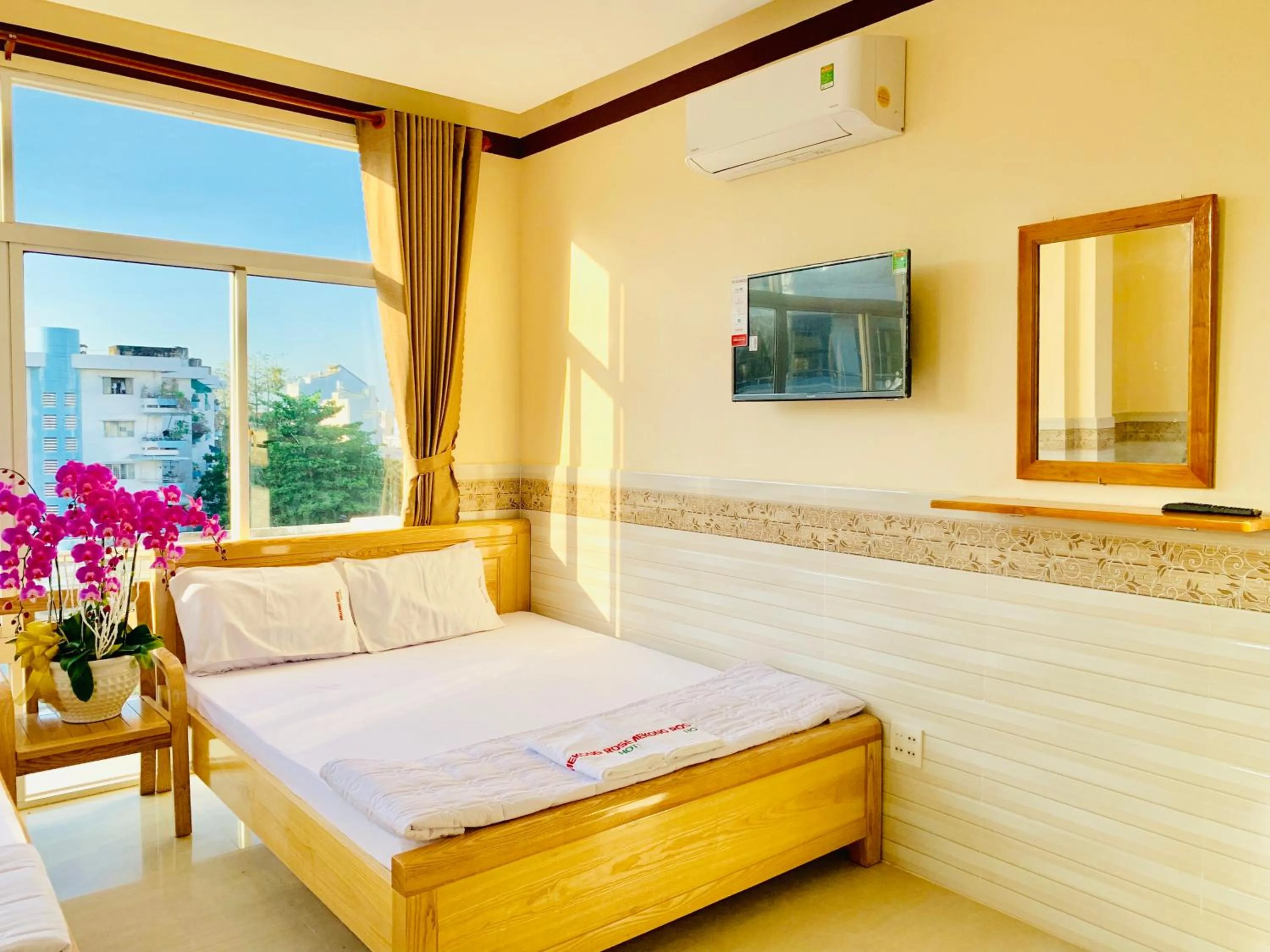 Bed in Mekong Rose Hotel