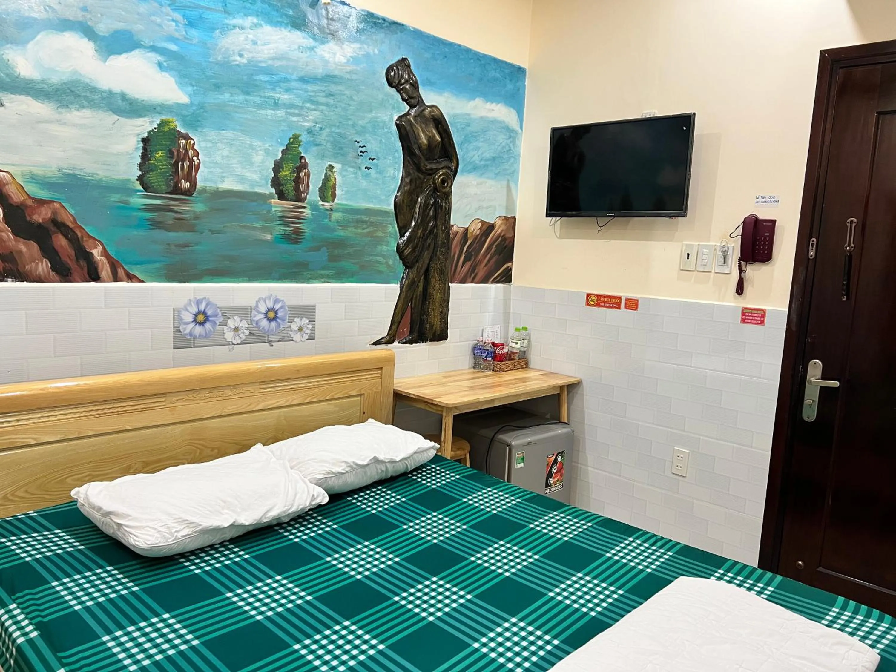 Bed in Mekong Rose Hotel