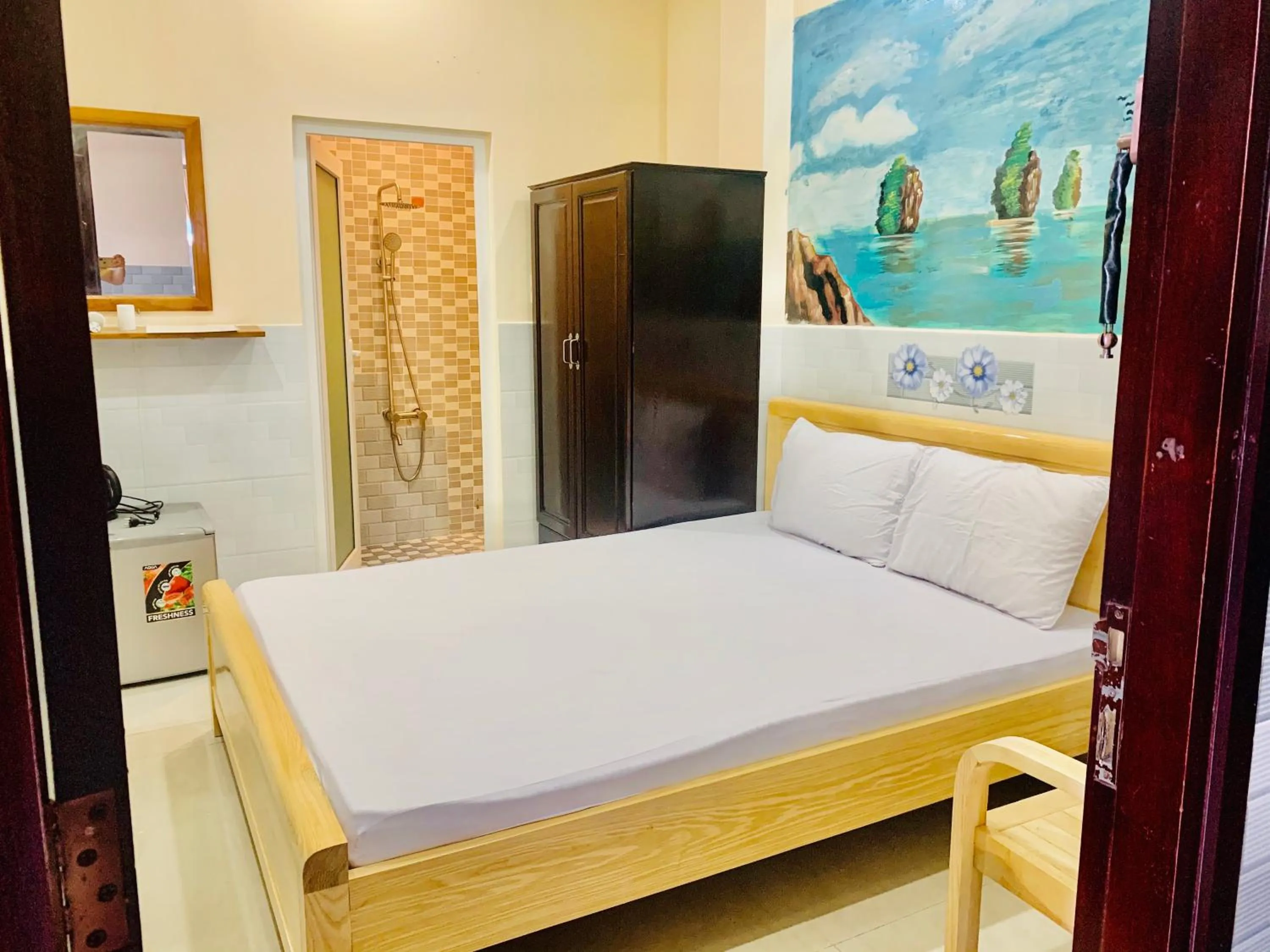 Bed in Mekong Rose Hotel