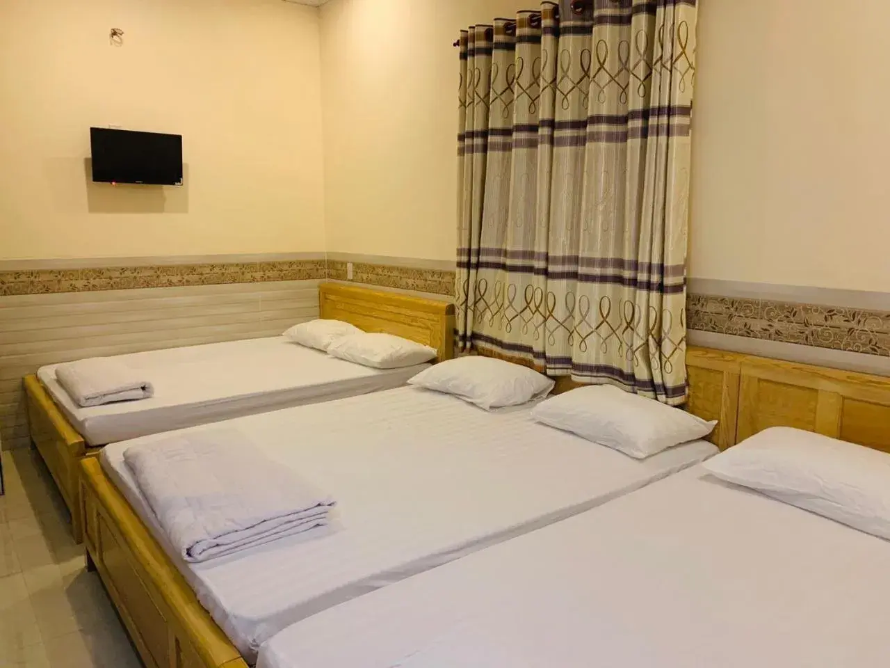 Family Room in Mekong Rose Hotel Family Room in Mekong Rose Hotel