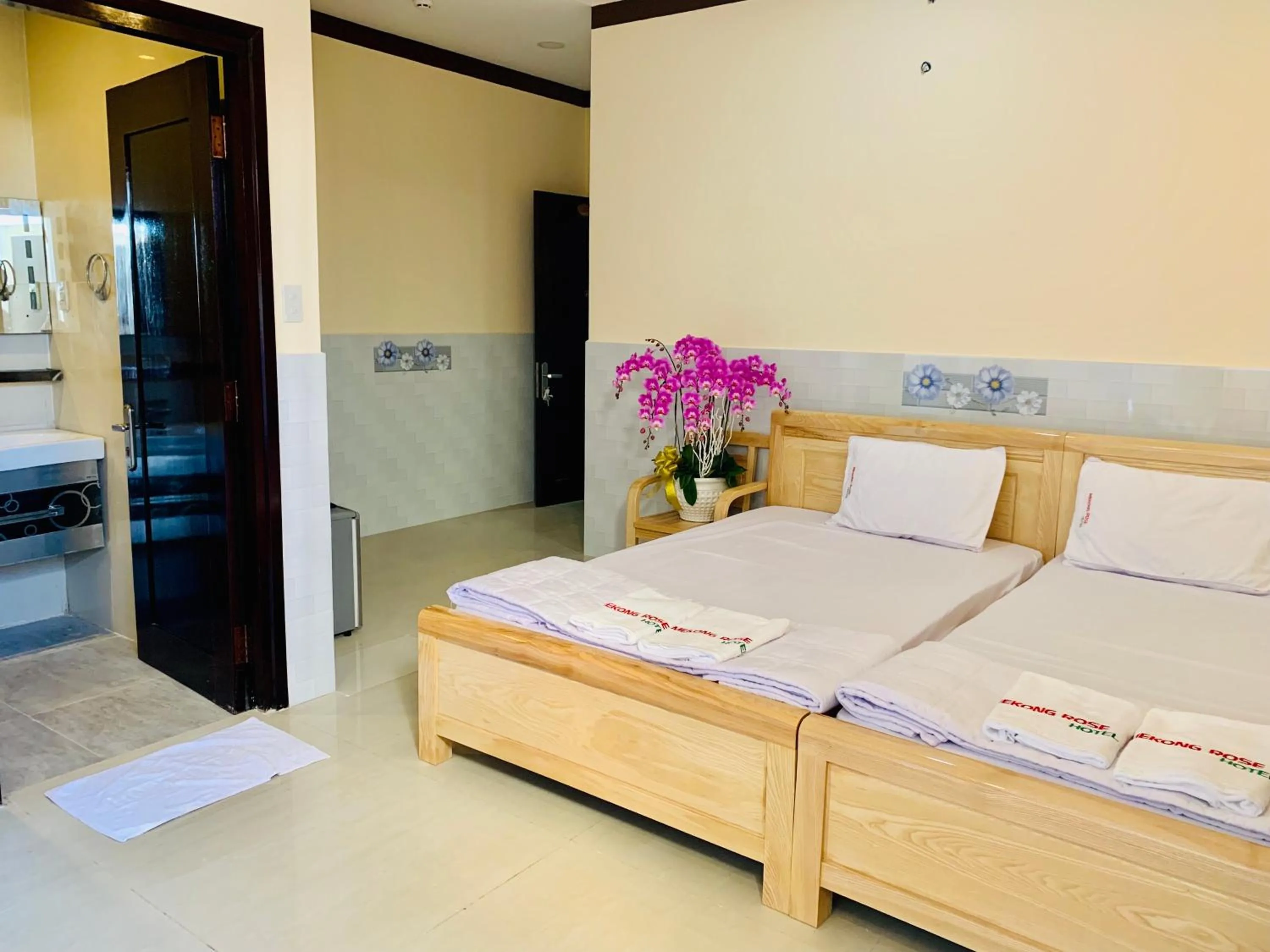 Bed in Mekong Rose Hotel