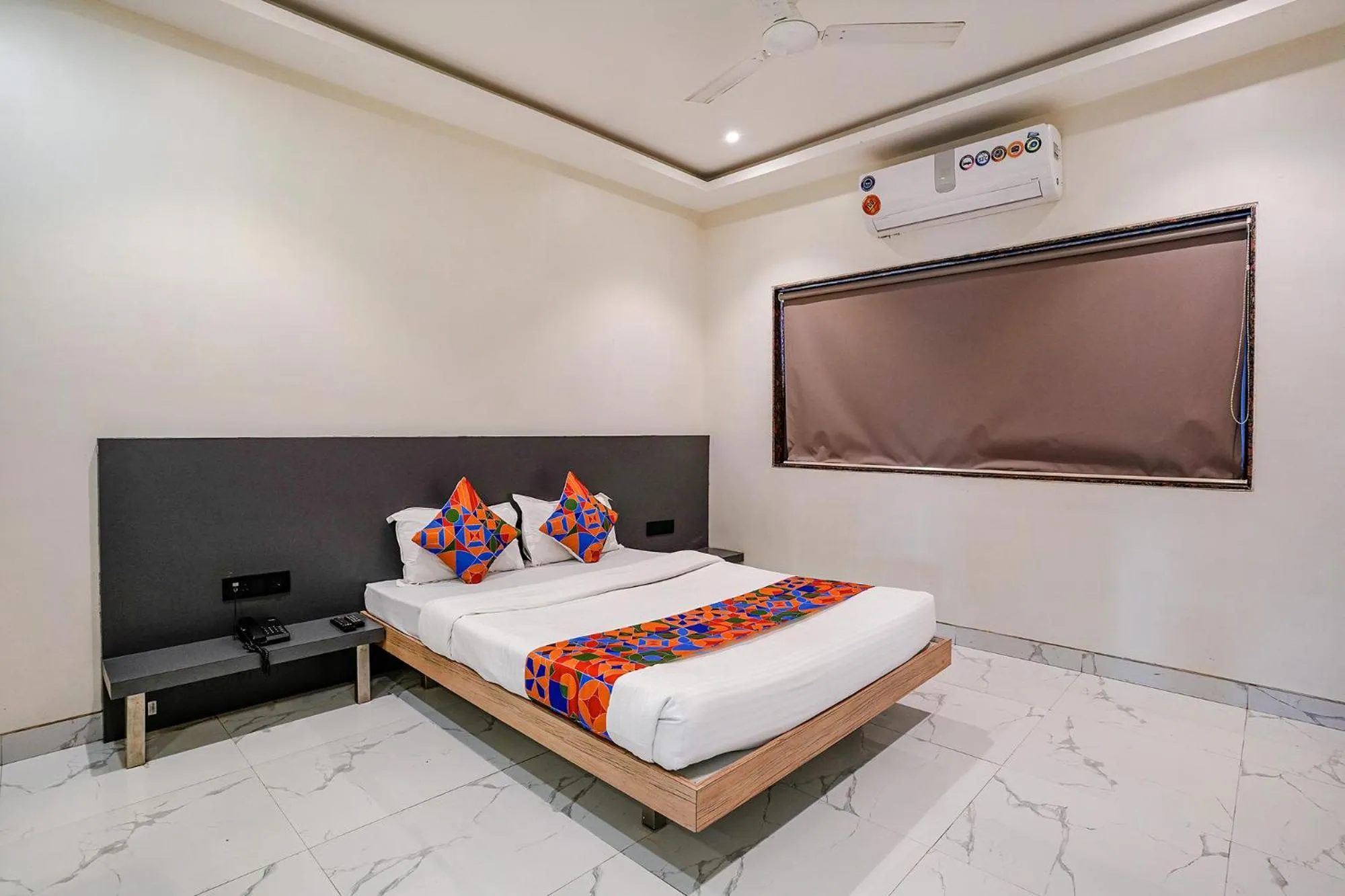 Bed in FabHotel Ansh