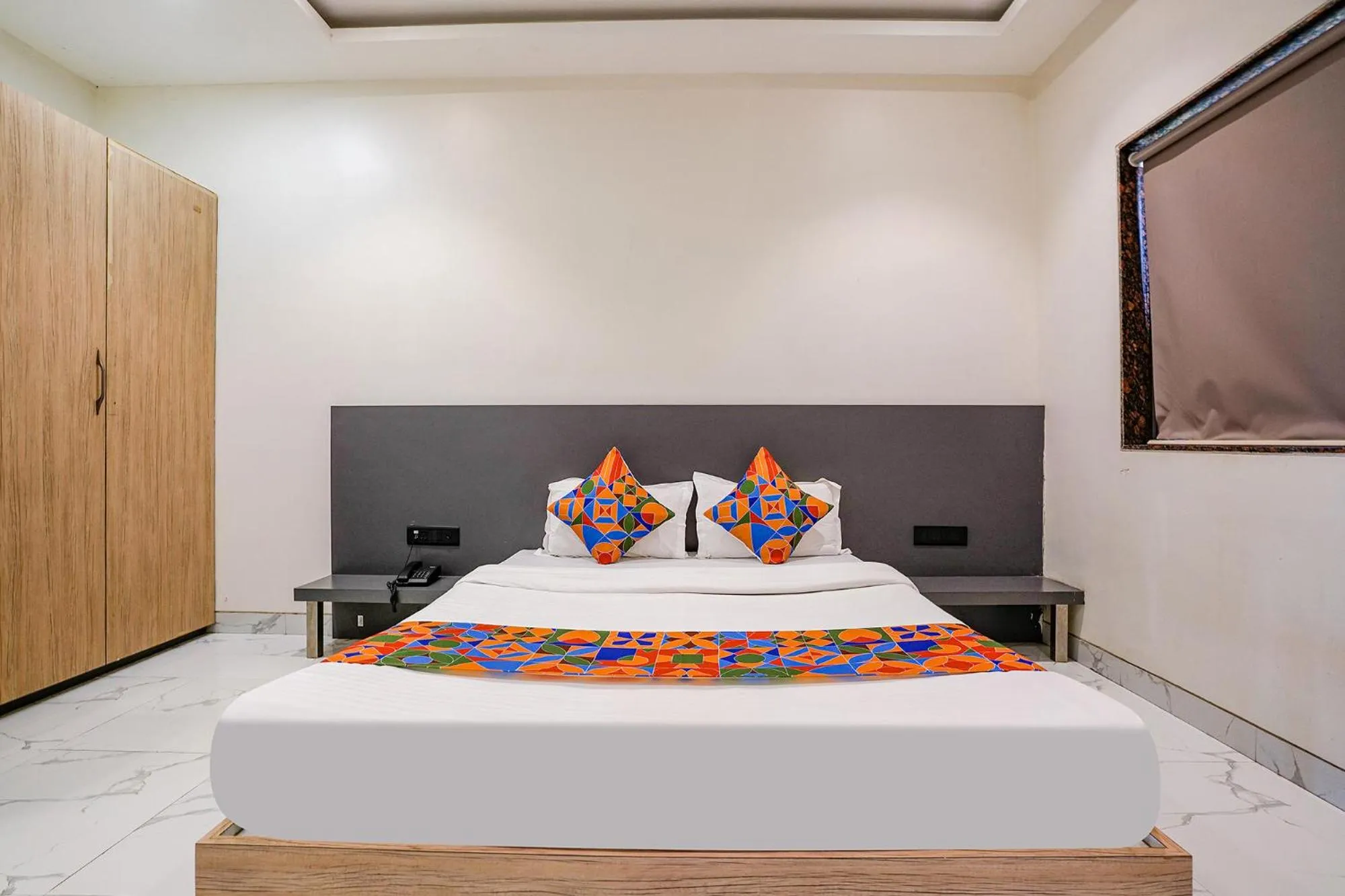 Bed in FabHotel Ansh