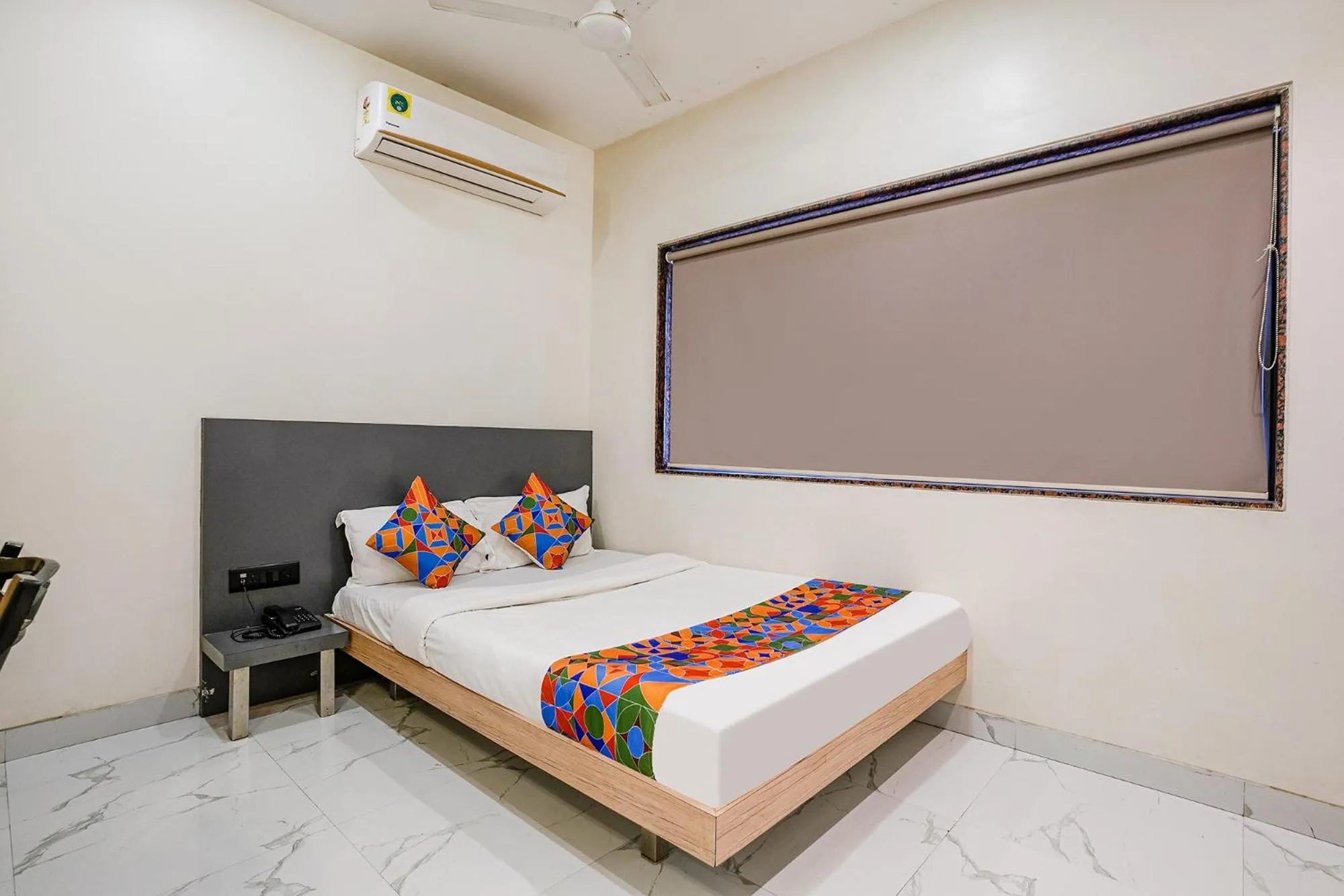 Bed in FabHotel Ansh